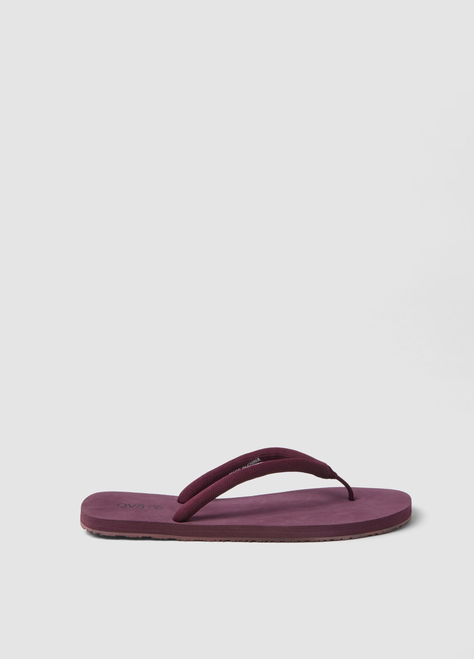 Purple flip-flops with thick straps
