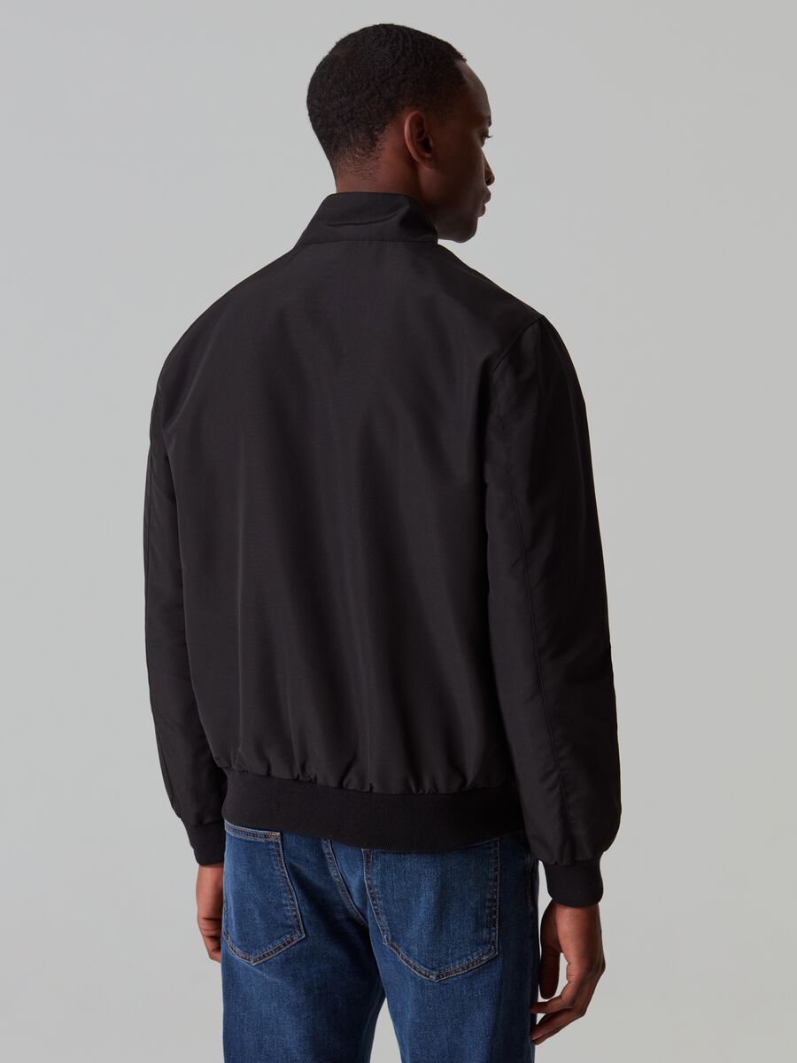 Full-zip bomber jacket with high neck and buttons_2