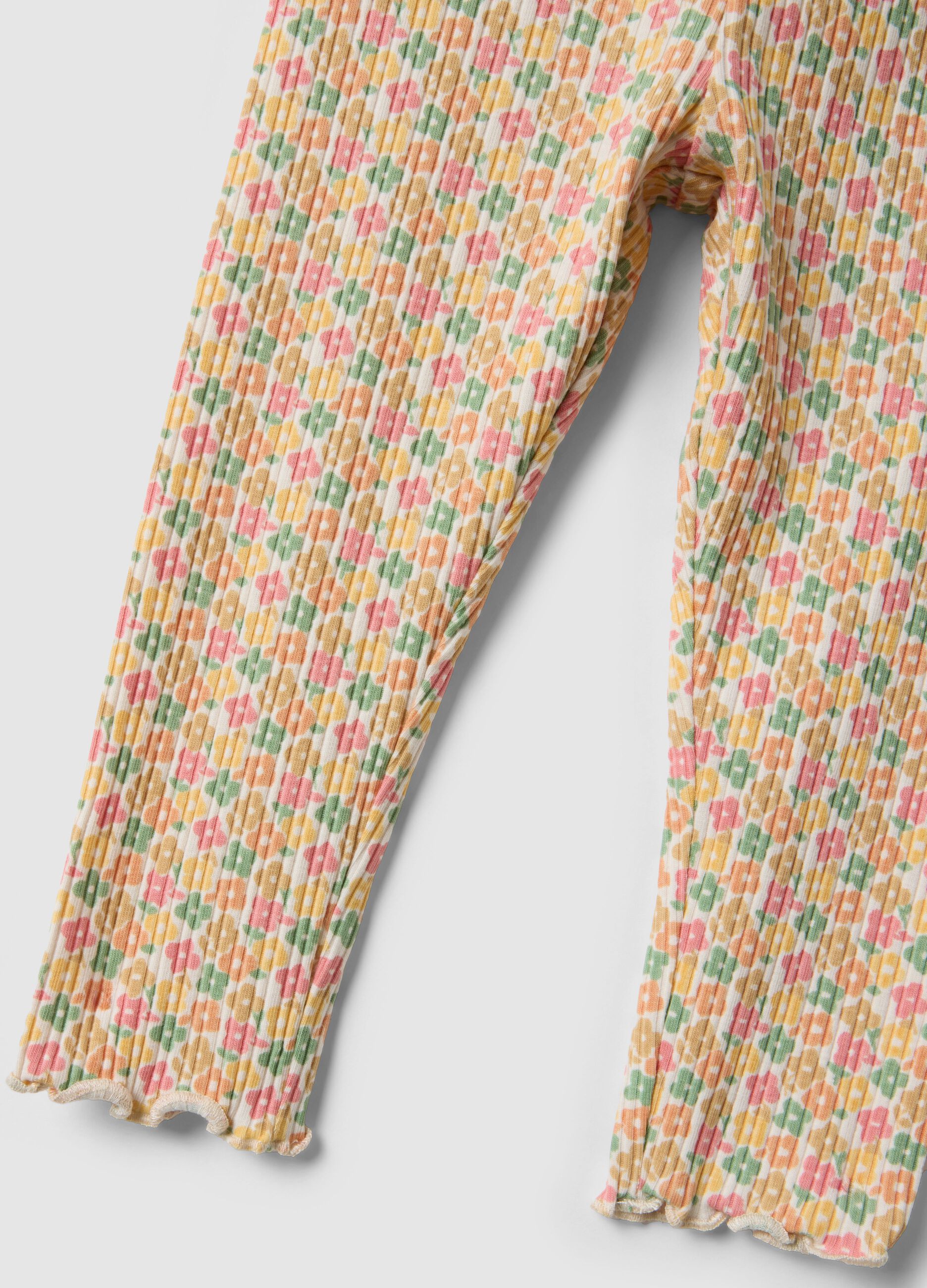 Leggings de menina slim fit em algod&atilde;o el&aacute;stico com padr&atilde;o floral