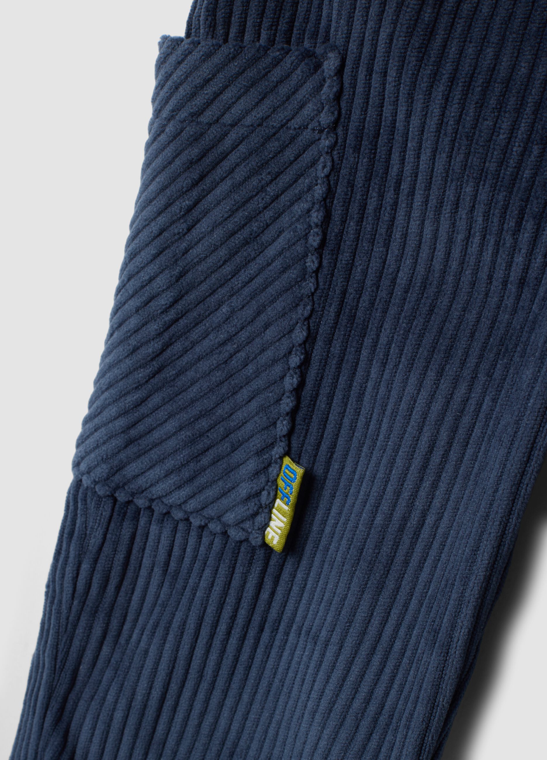 Blue ribbed over-fit trousers with patch pockets