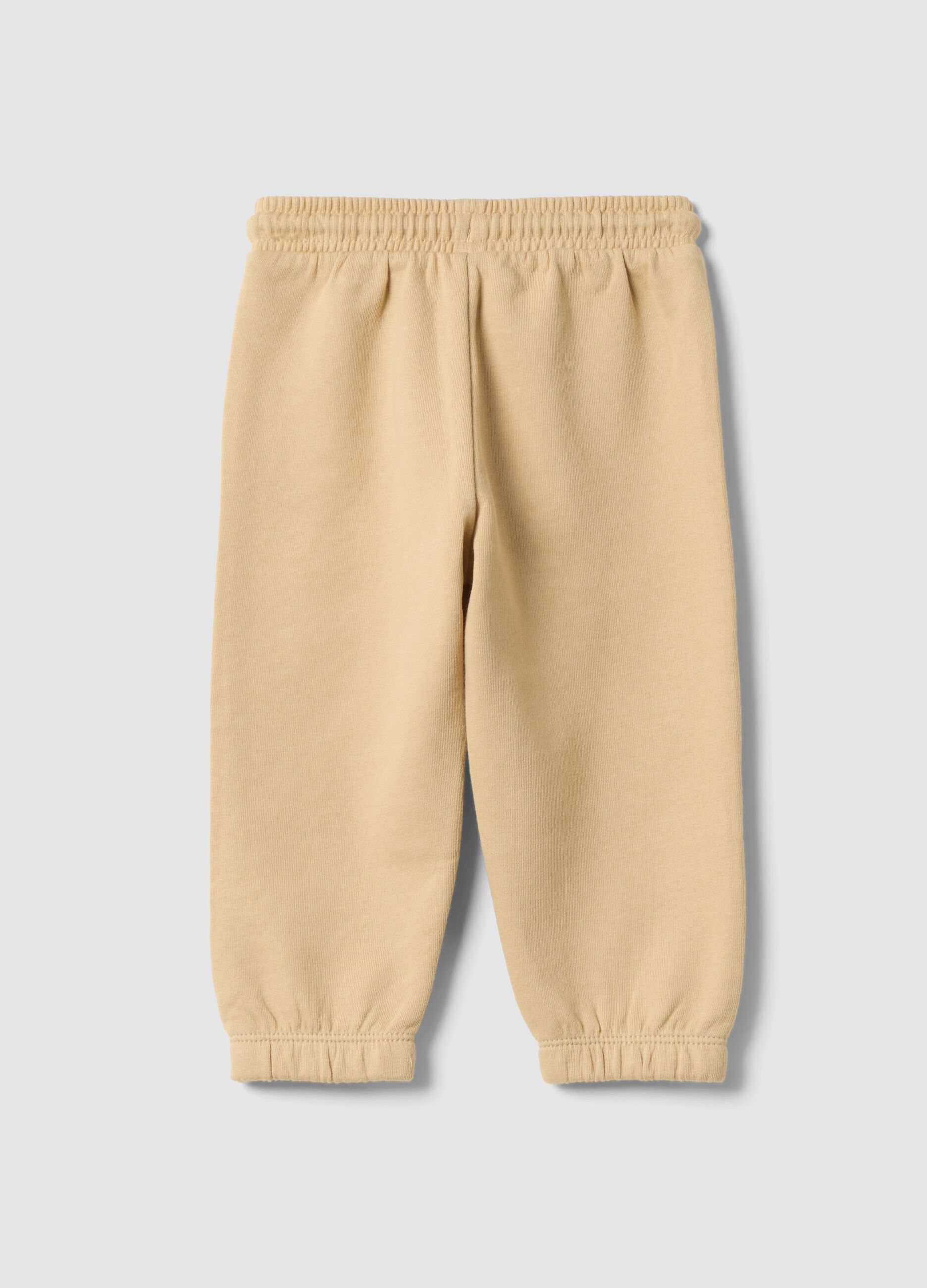 Beige pure cotton joggers with print