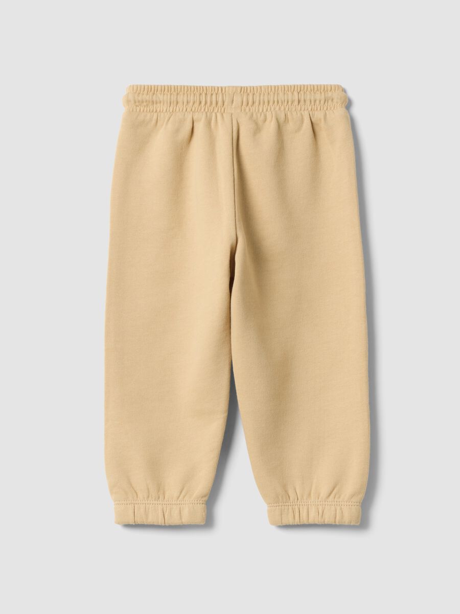 Beige pure cotton joggers with print_1