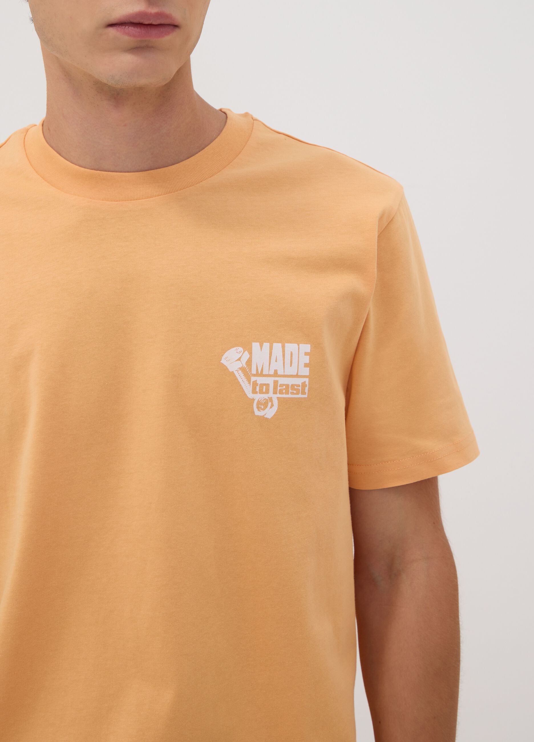 Orange pure cotton jersey T-shirt with chest print, regular fit