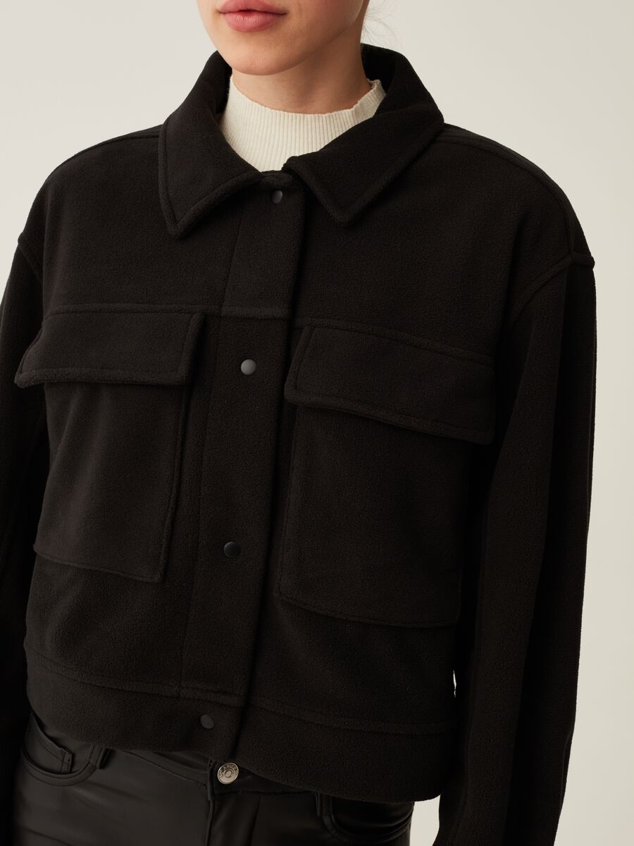 Short fleece jacket with pockets_3