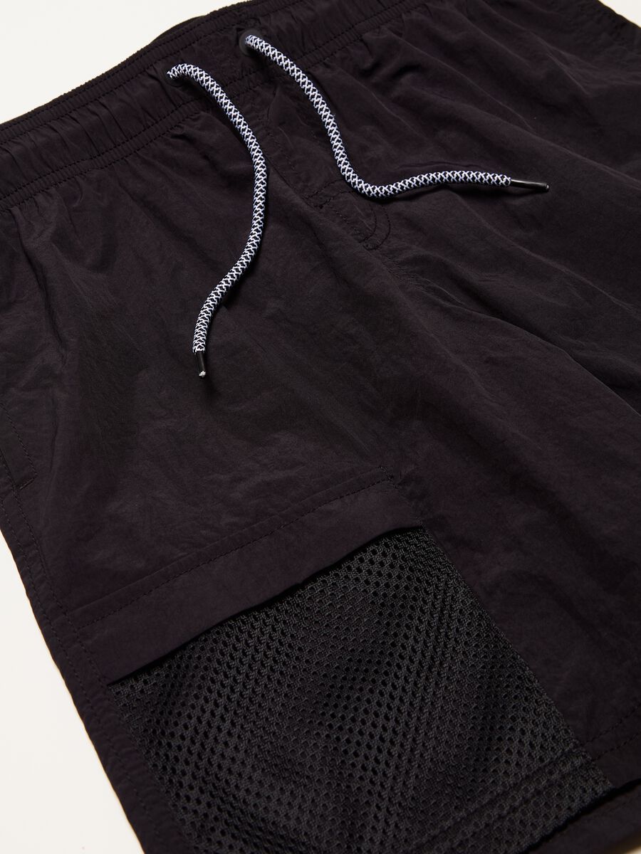 Swimming trunks with external elastic_2