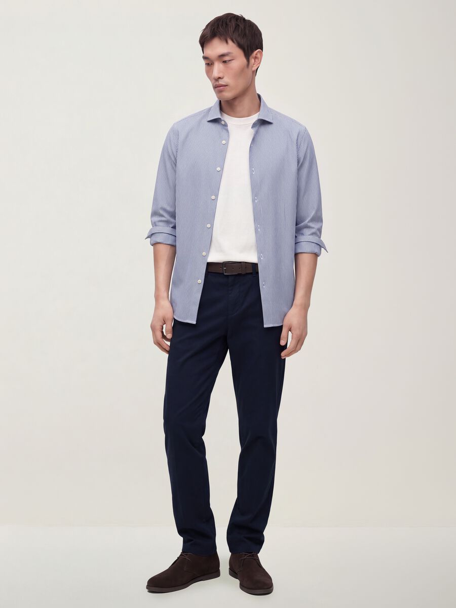 Pantaloni chino blu in twill di cotone elasticizzato slim fit_1