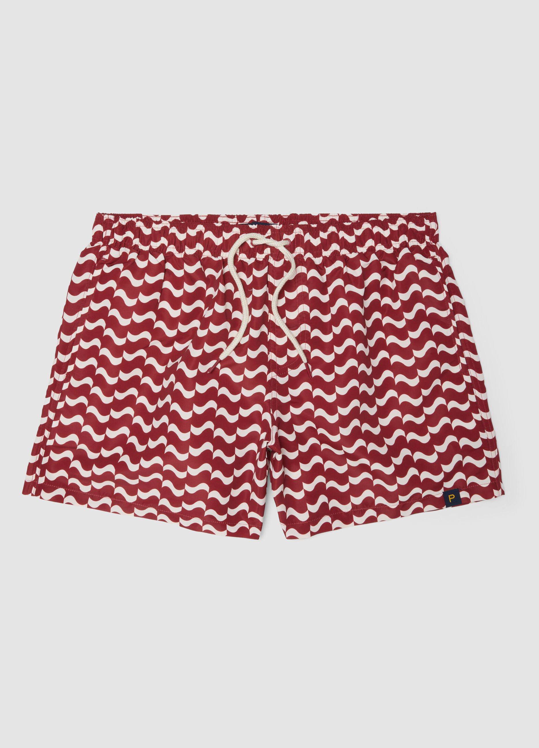Red men&rsquo;s swim shorts with all-over print