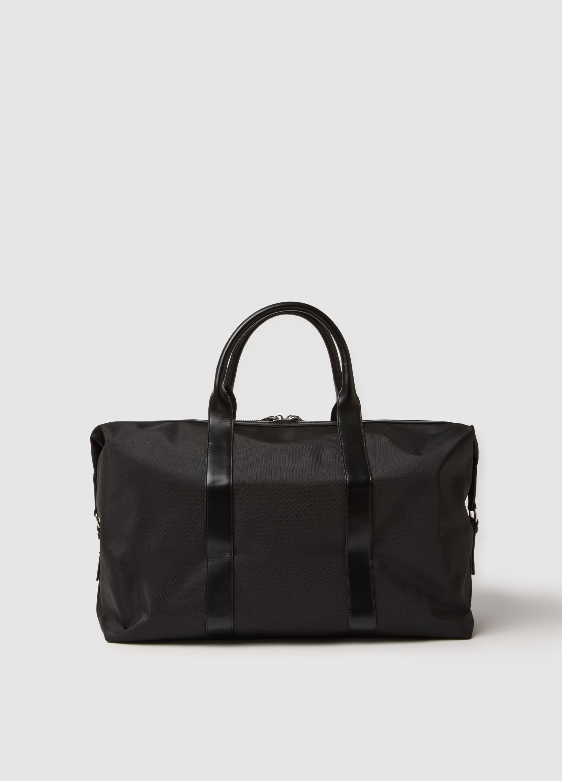 Black travel bag with strong handles and zip closure