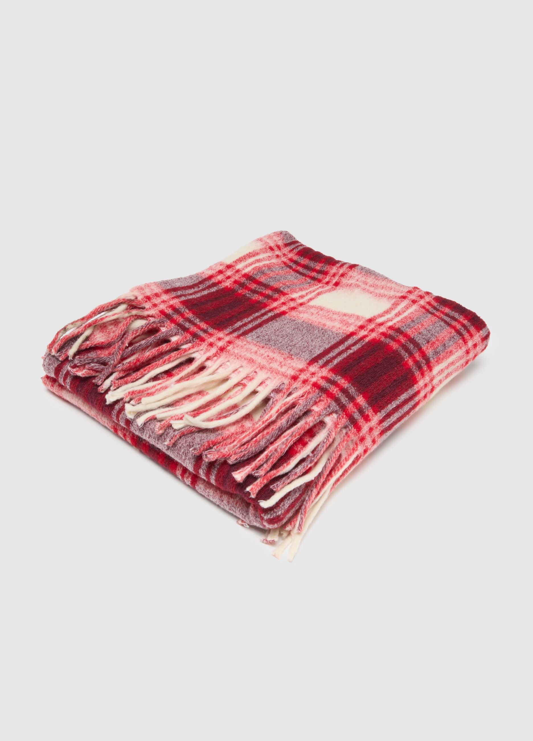 Coperta in misto lana a quadri multicolor con frange