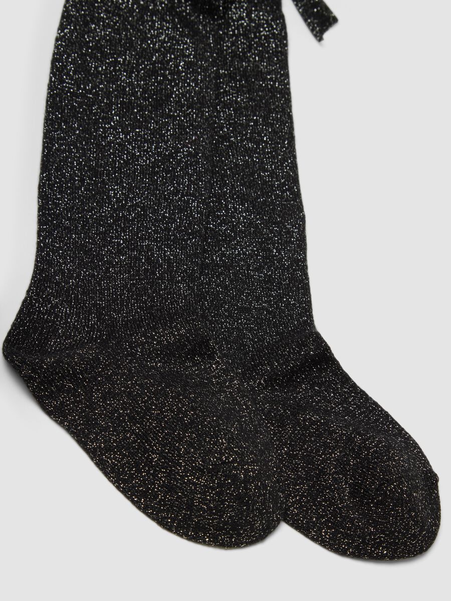 Collant nero in cotone organico elasticizzato con fiocco e brillantini_1