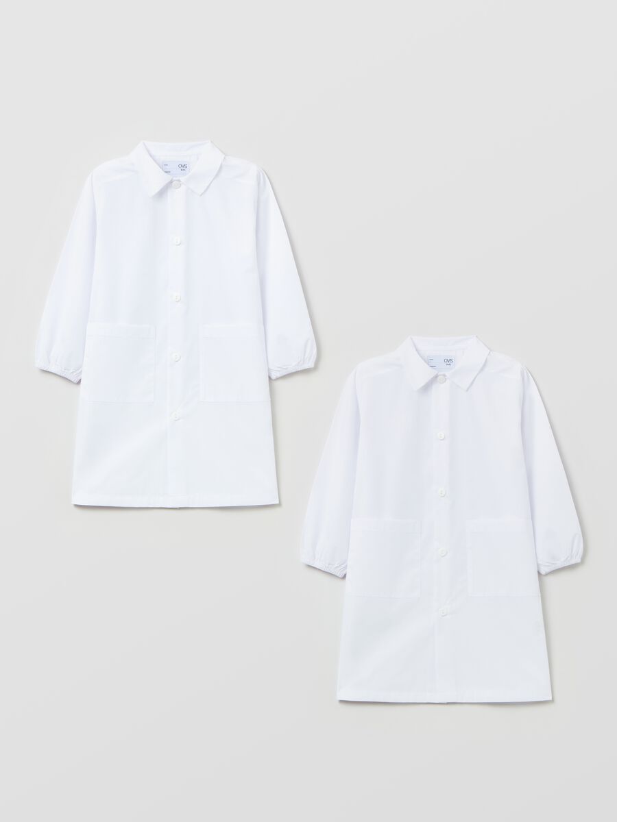 Two-pack solid colour school smocks with buttons_0
