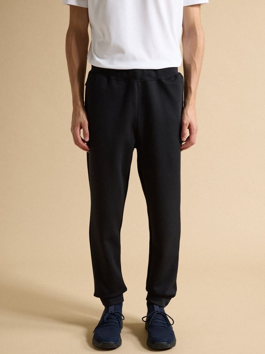 Black regular-fit joggers in stretch Easy Dry fabric_1
