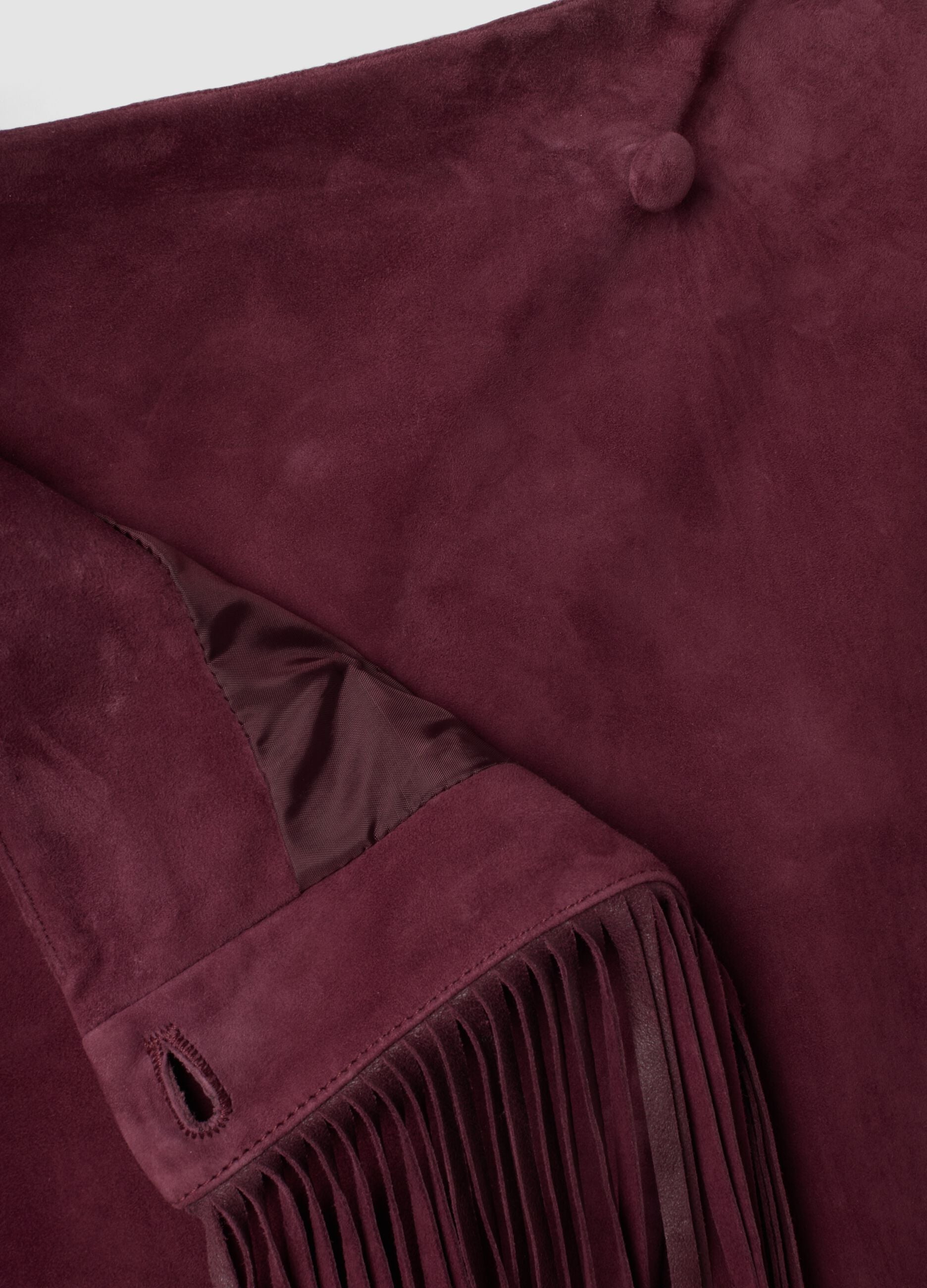 Red genuine leather skirt with fringes