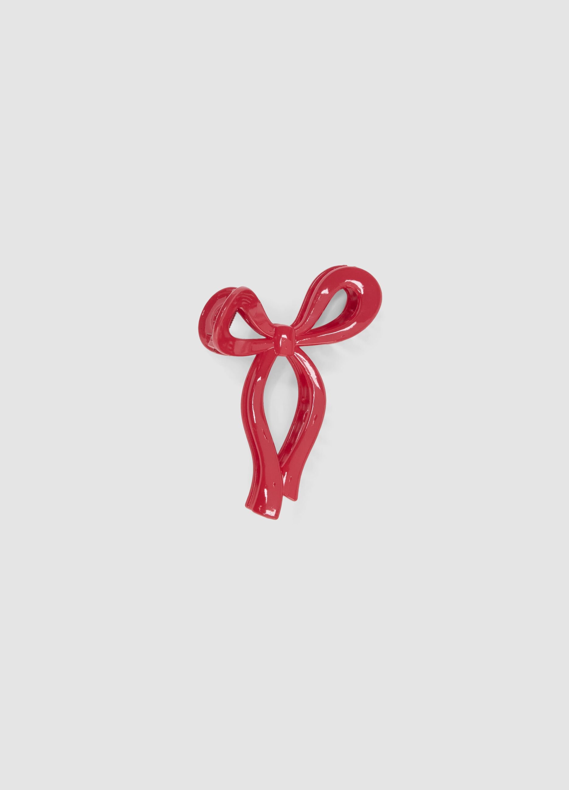 Red bow-shaped hair clip