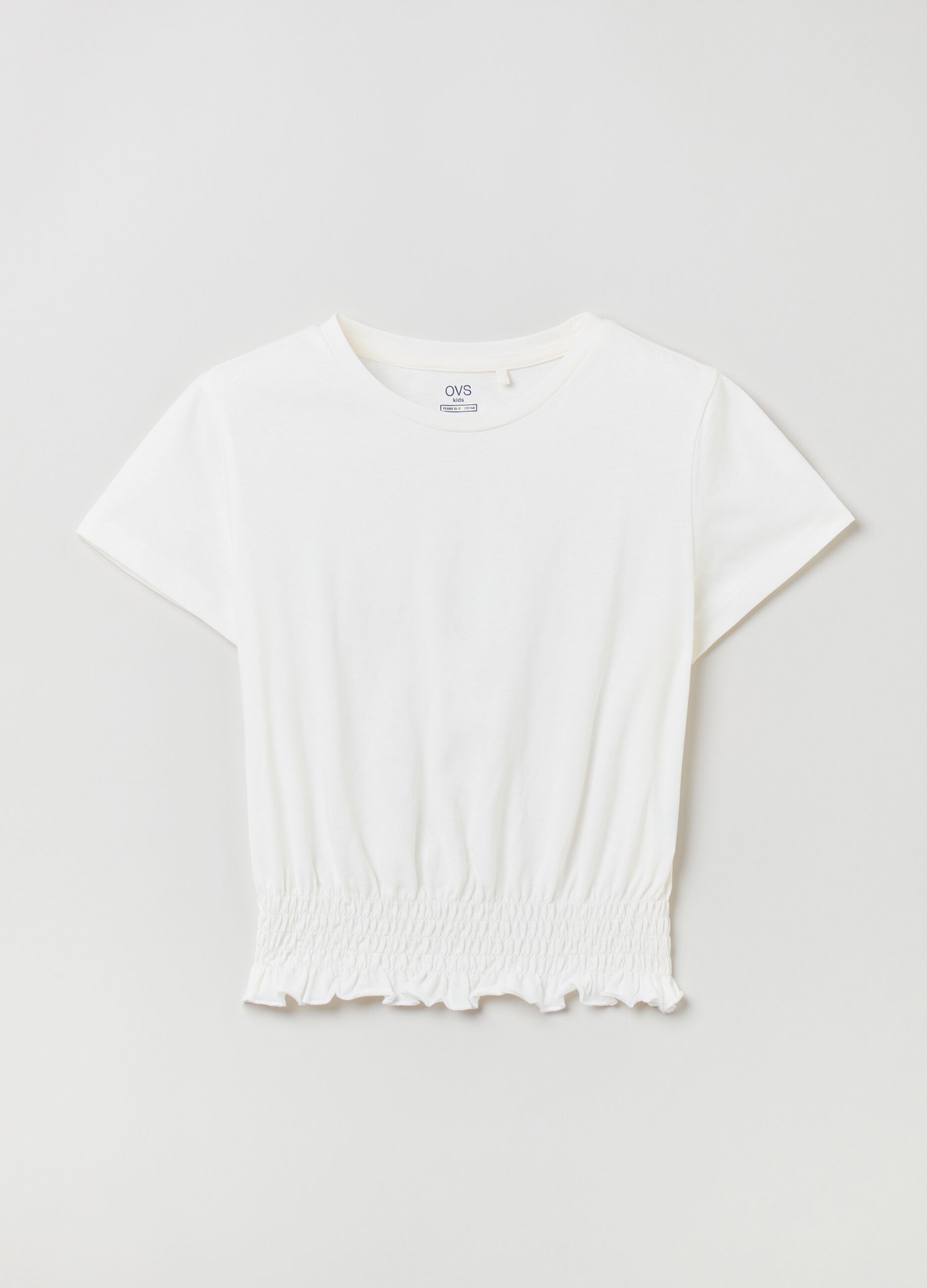 Camiseta de algodón con bajo elástico