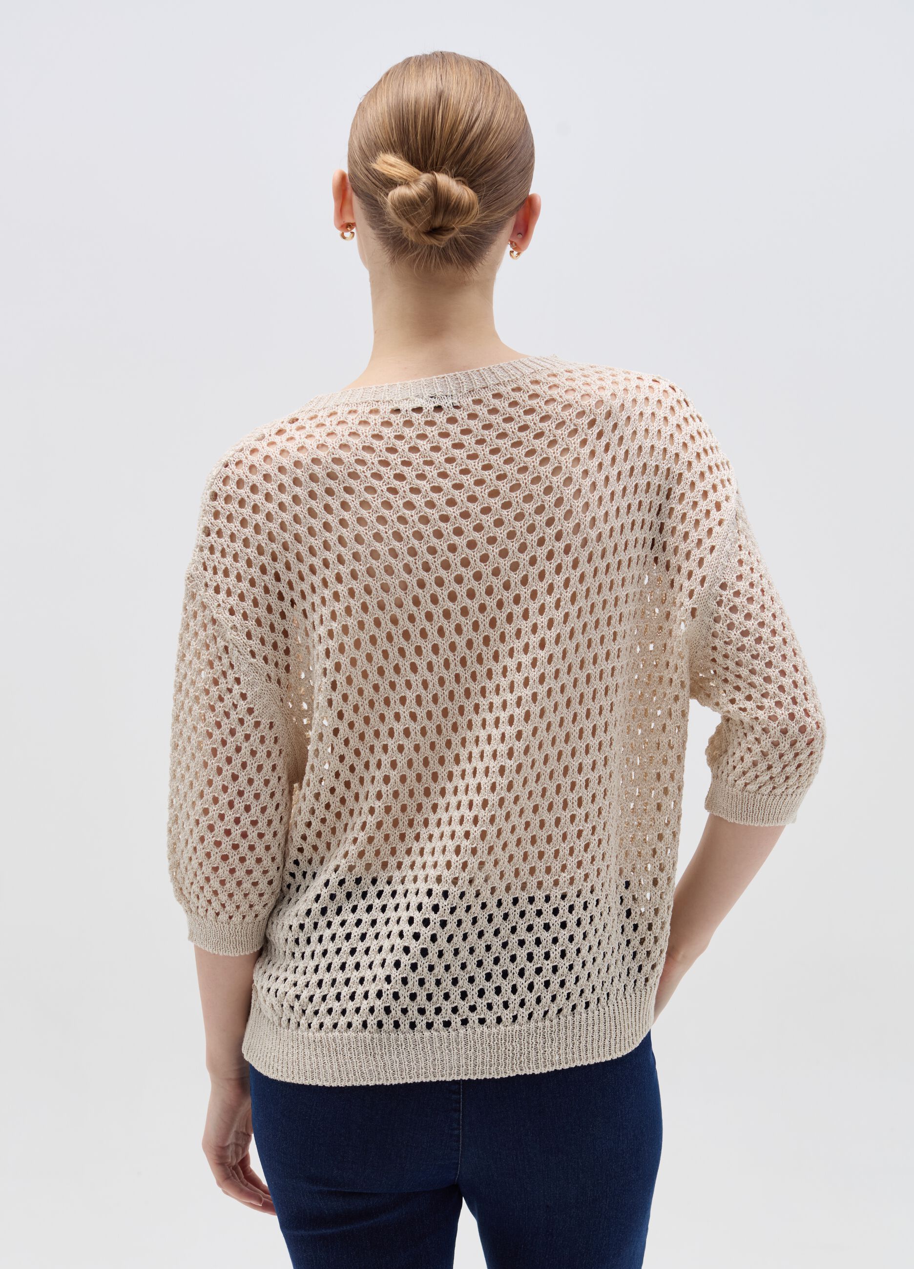 Pullover with open stitch design