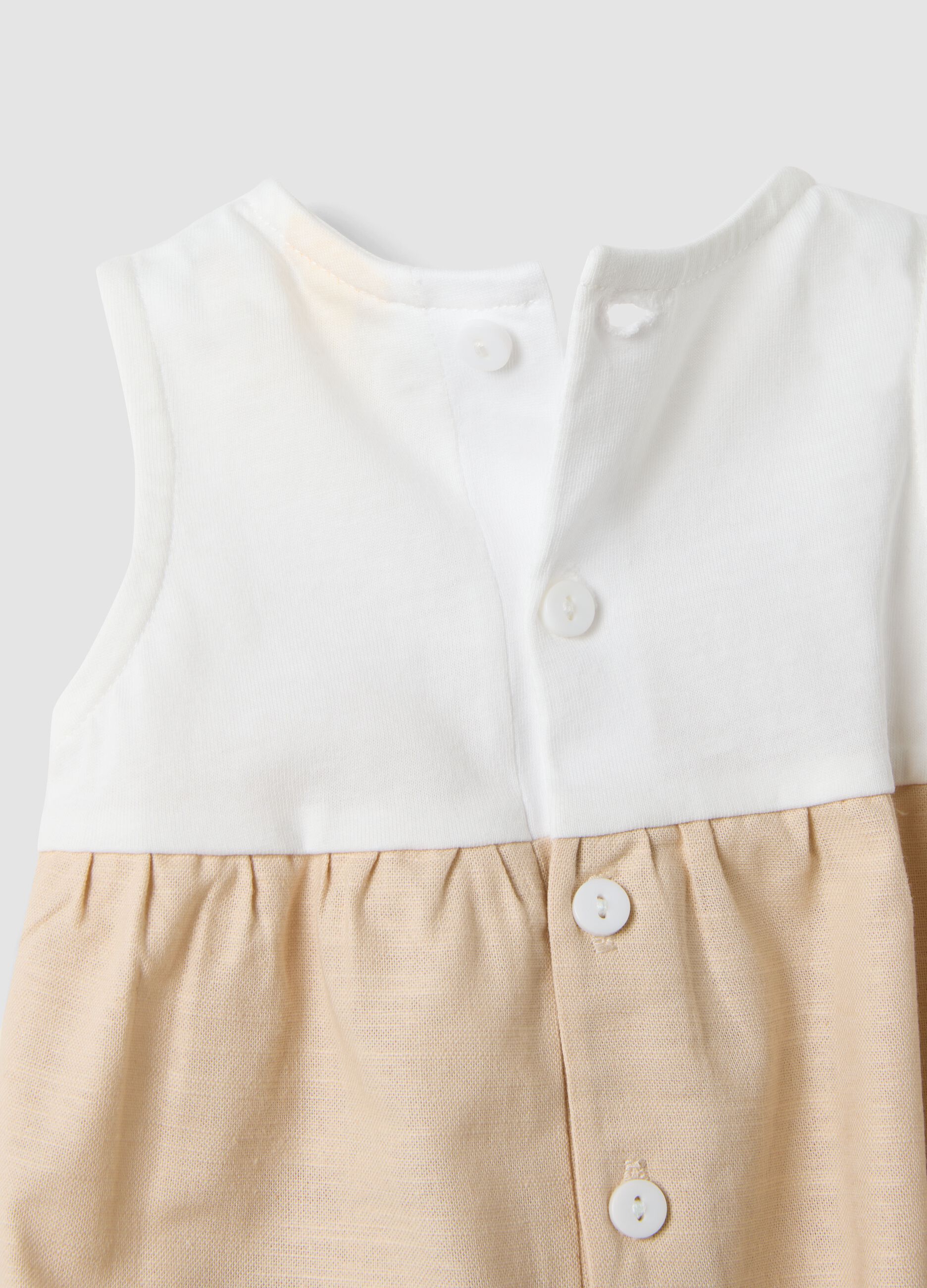 Beige organic cotton baby romper