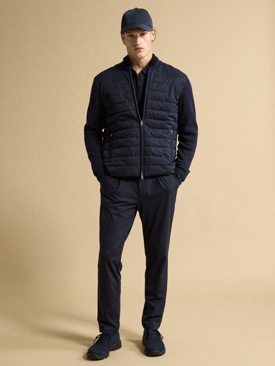 Blue 4-way stretch regular-fit trousers with Easy Iron finish_0