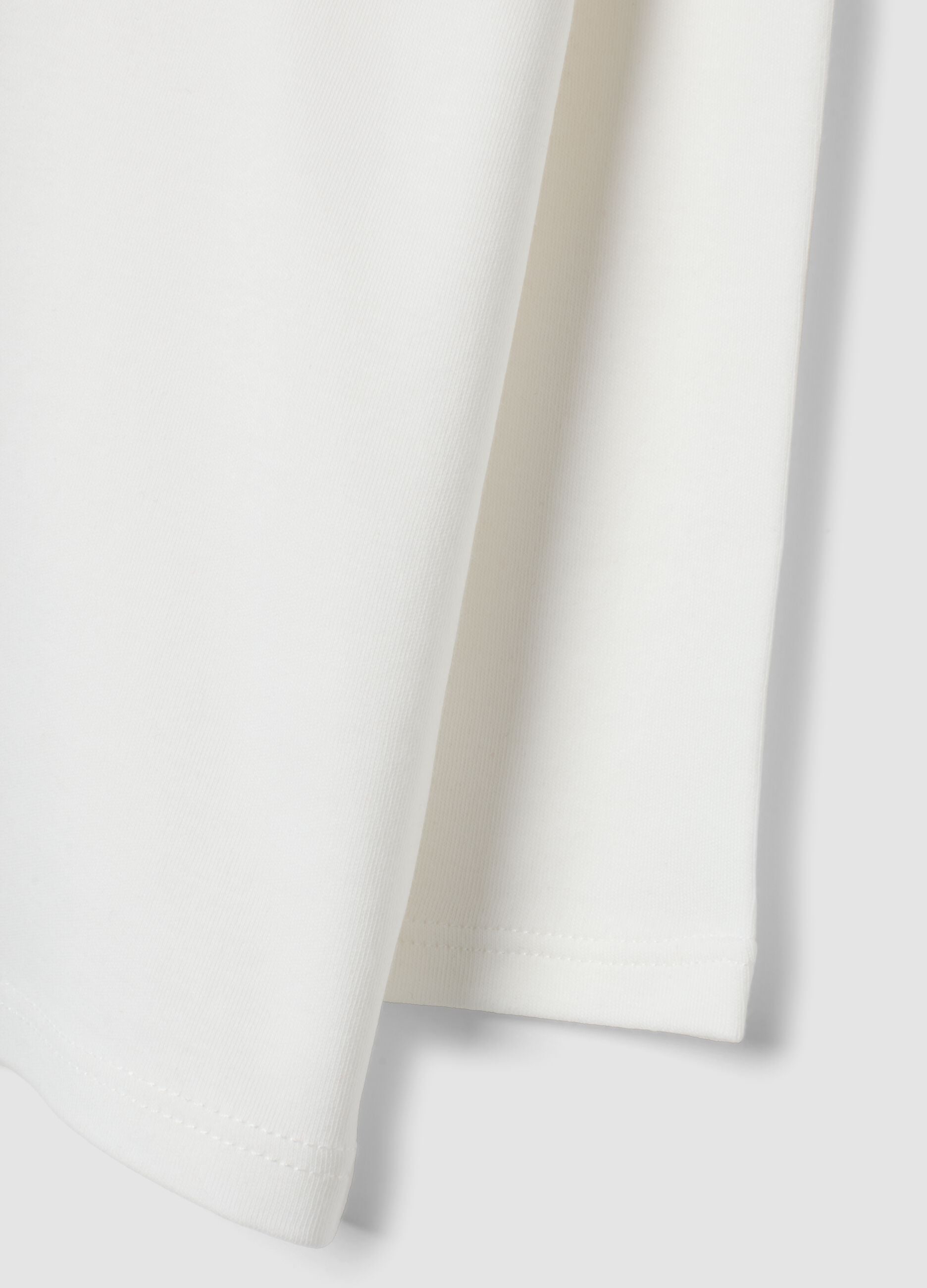 White pure cotton top with high neck and ruffles