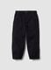 Black stretch cotton jogger trousers for boys_0