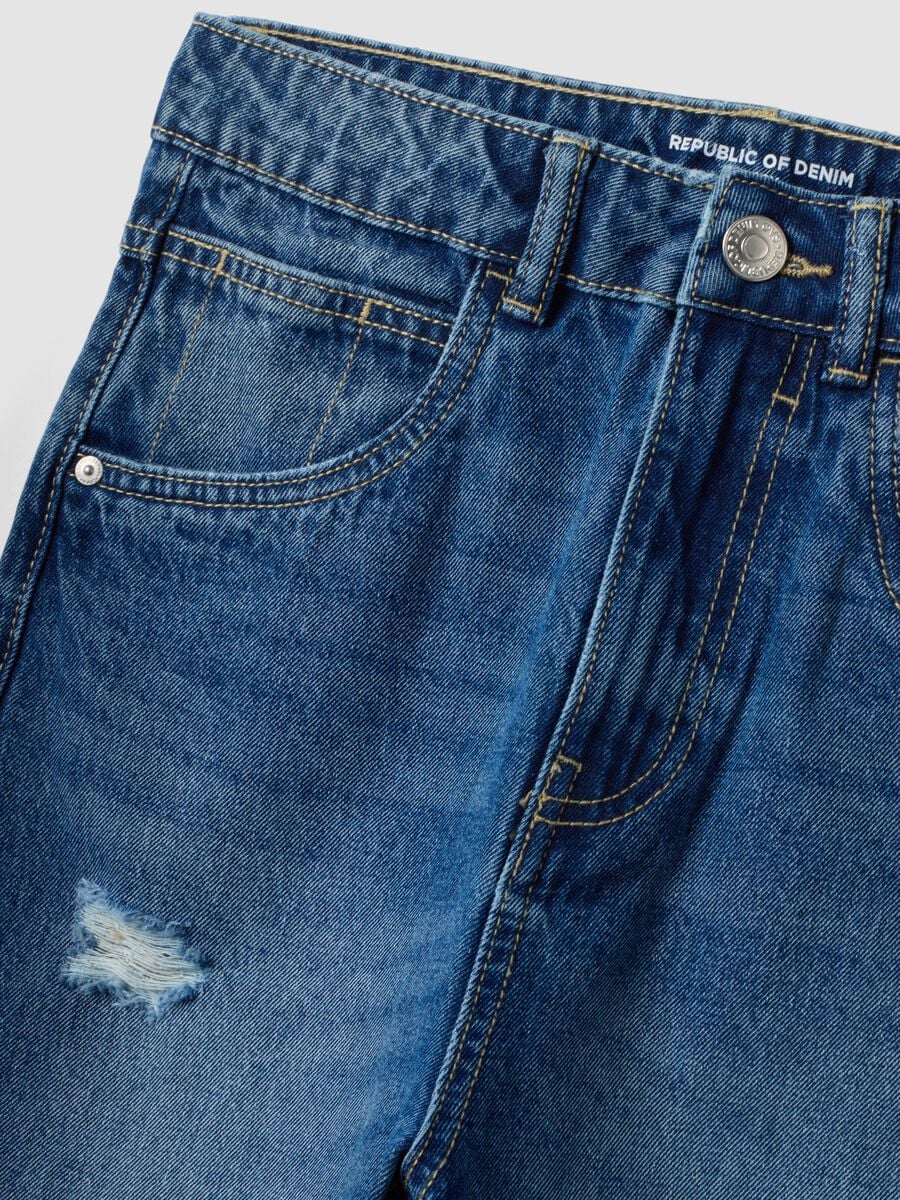 Jeans blu baggy in puro cotone con strappi per ragazzo_1