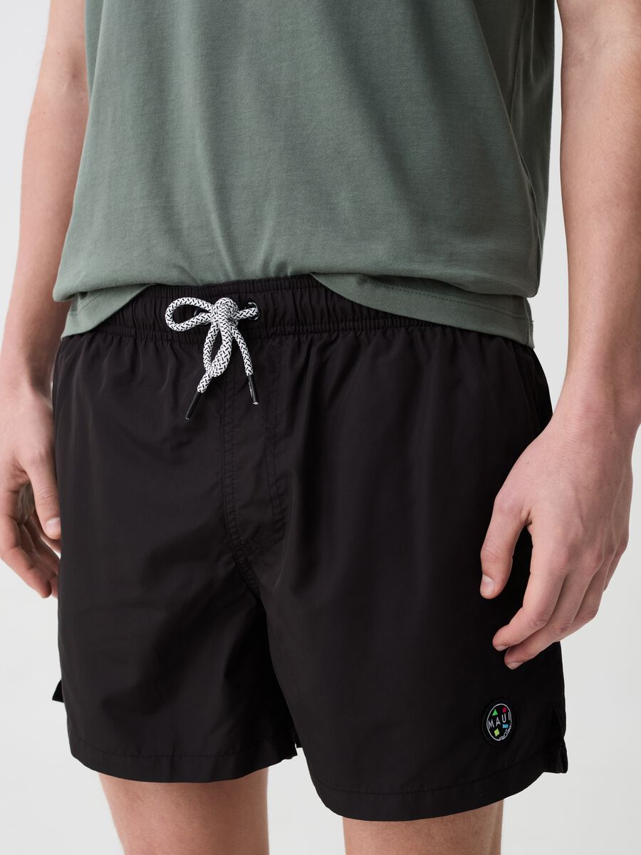 Swimming trunks with logo patch_1