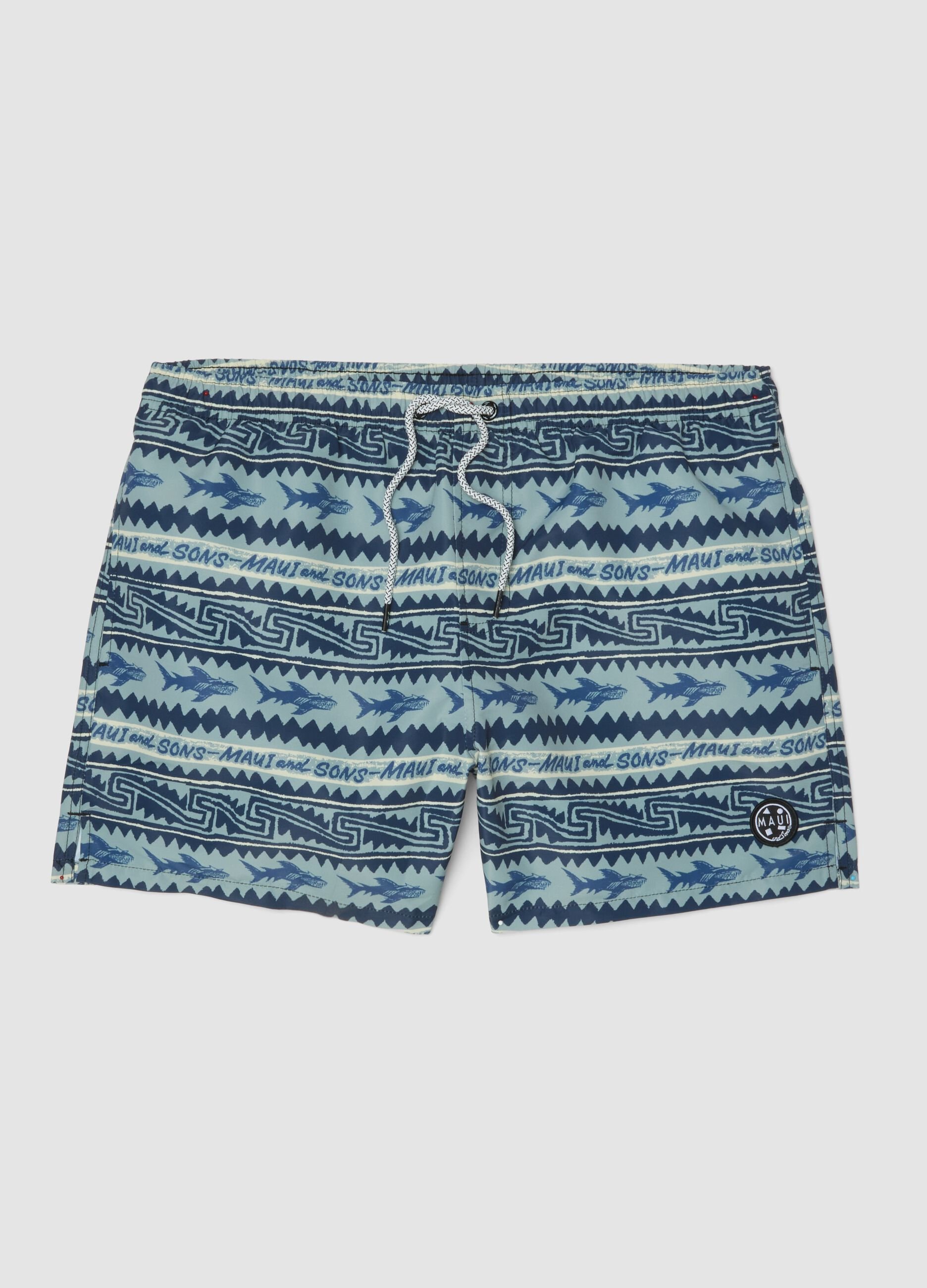 Multicolour swim shorts with sharks and geometric patterns