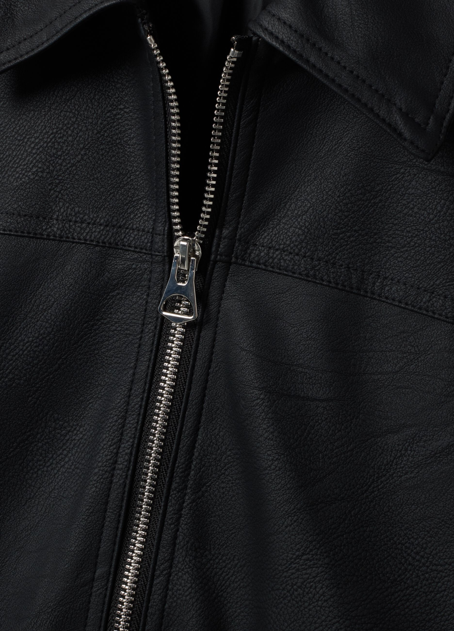 Black zip-up jacket with slim-fit collar