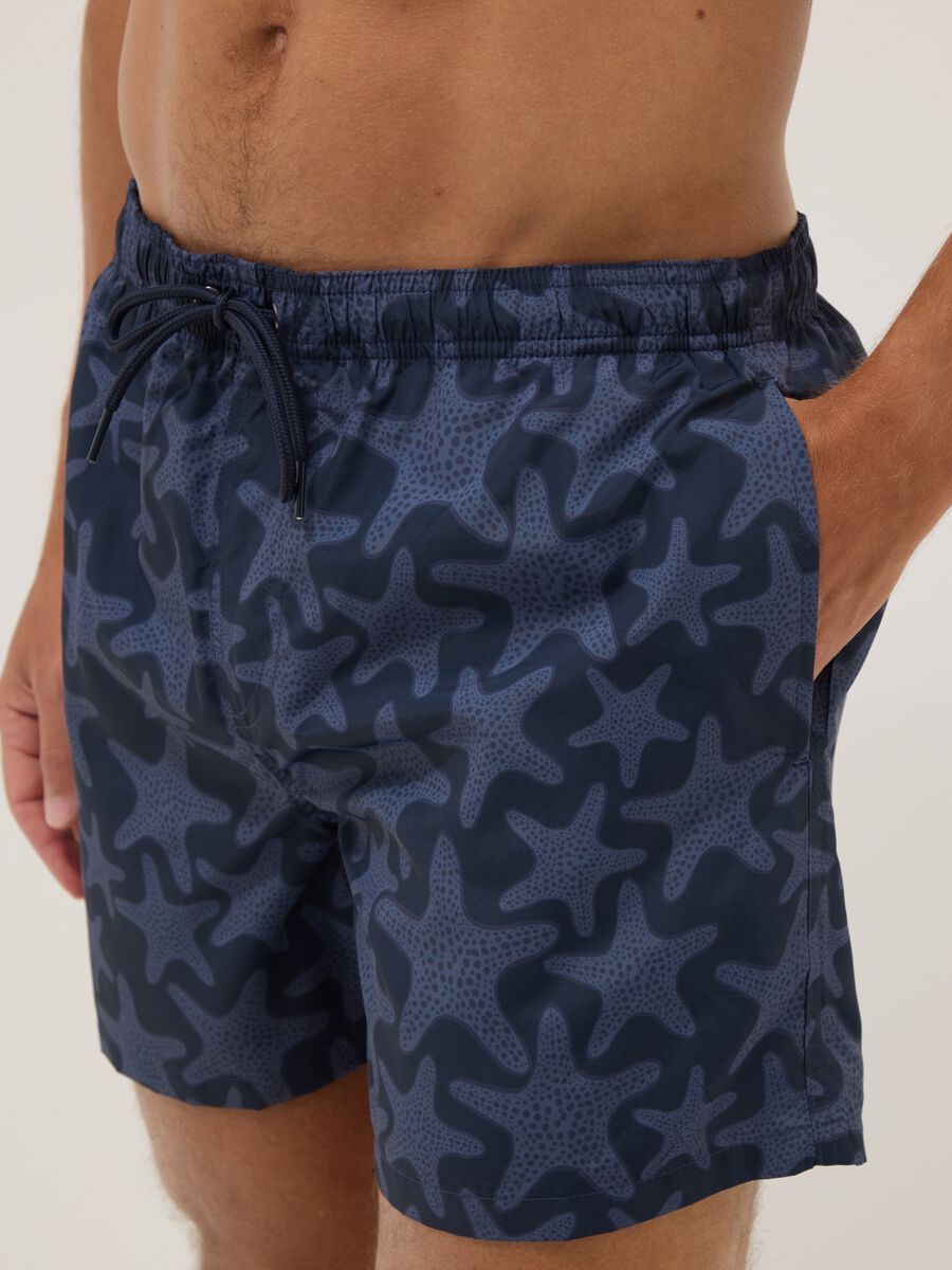 Blue swim shorts with starfish print_3