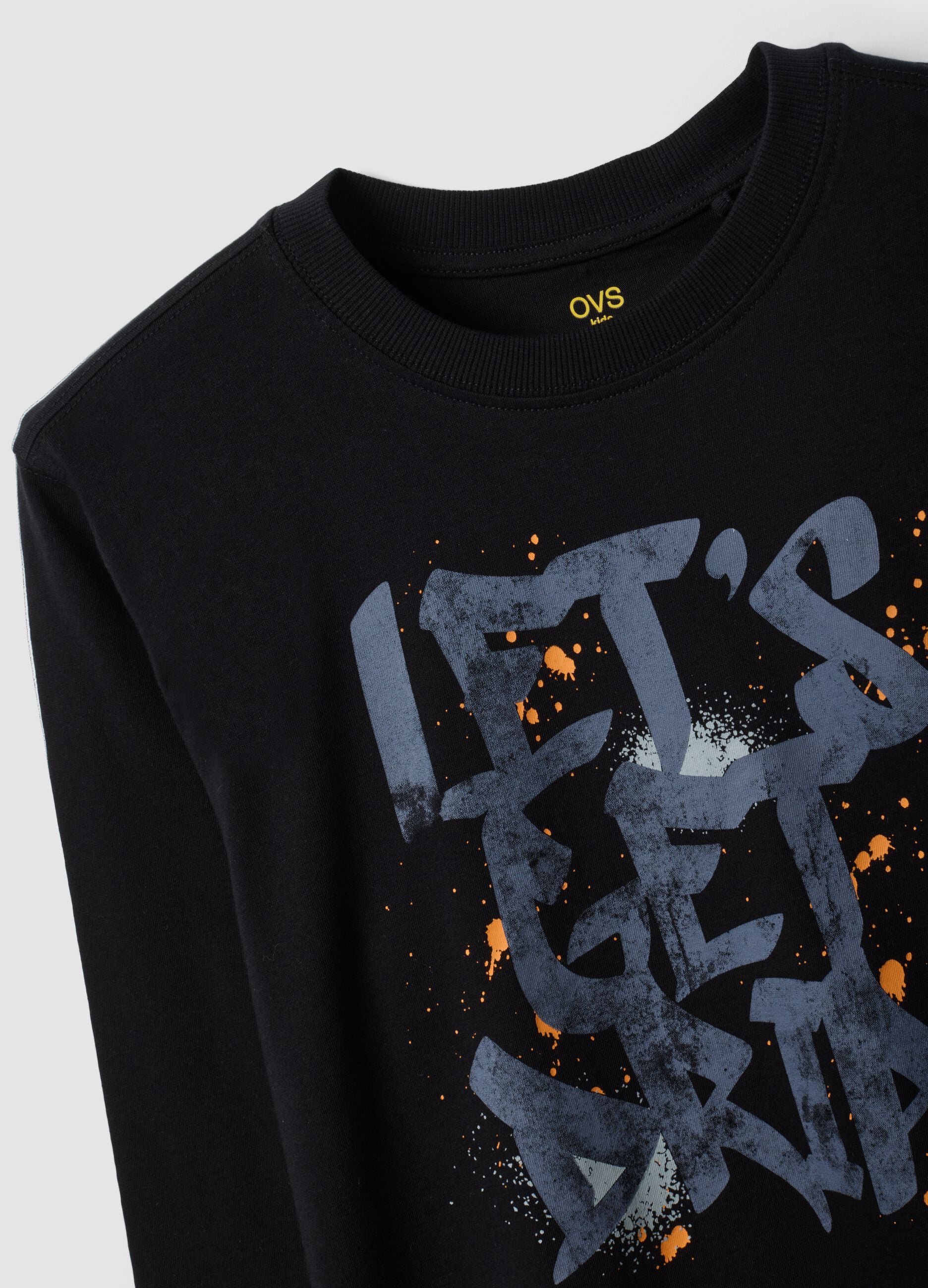 Black organic cotton T-shirt with "Let's get drip" slogan for boys