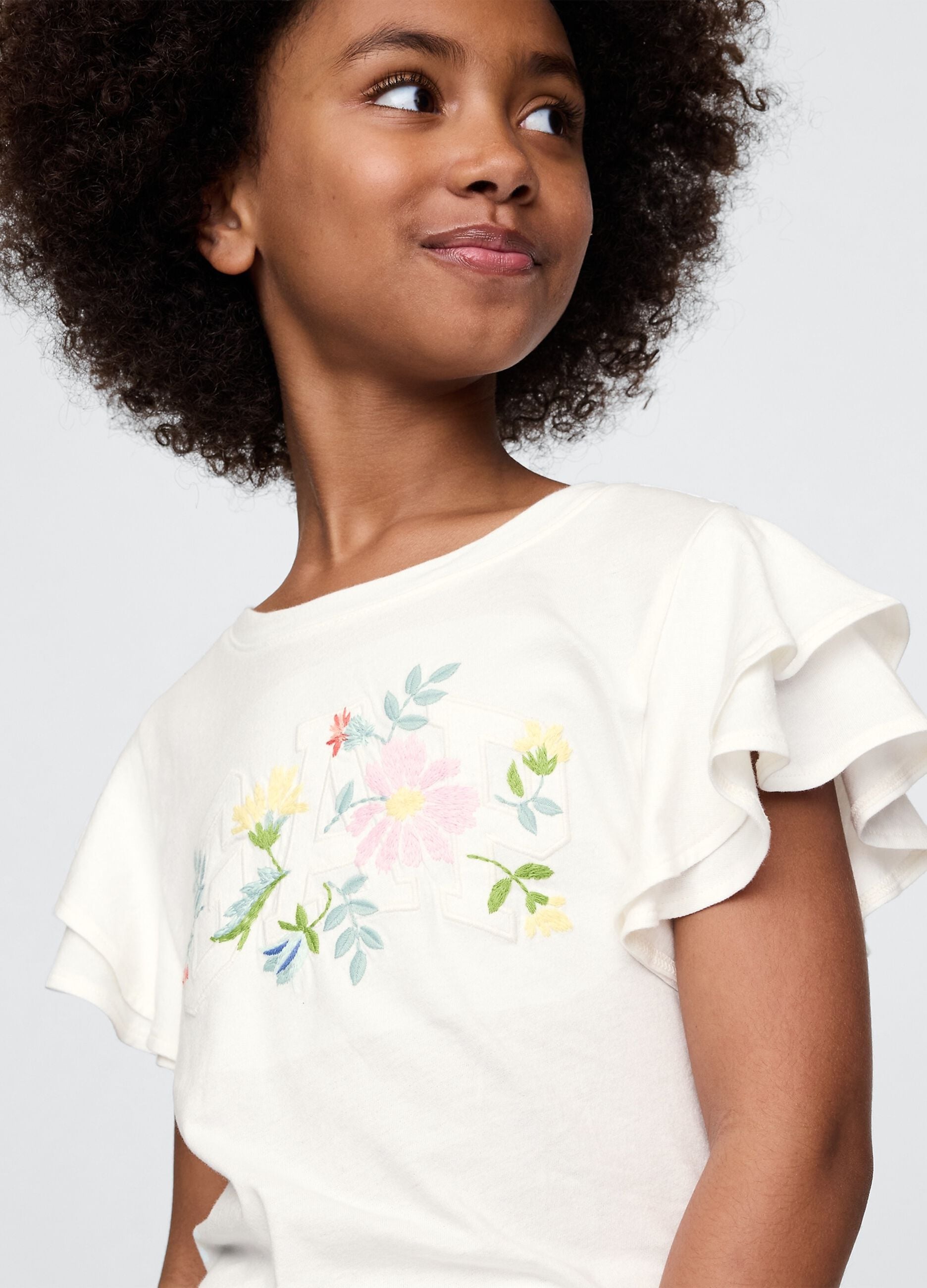 White short sleeve t-shirt with frills and floral print