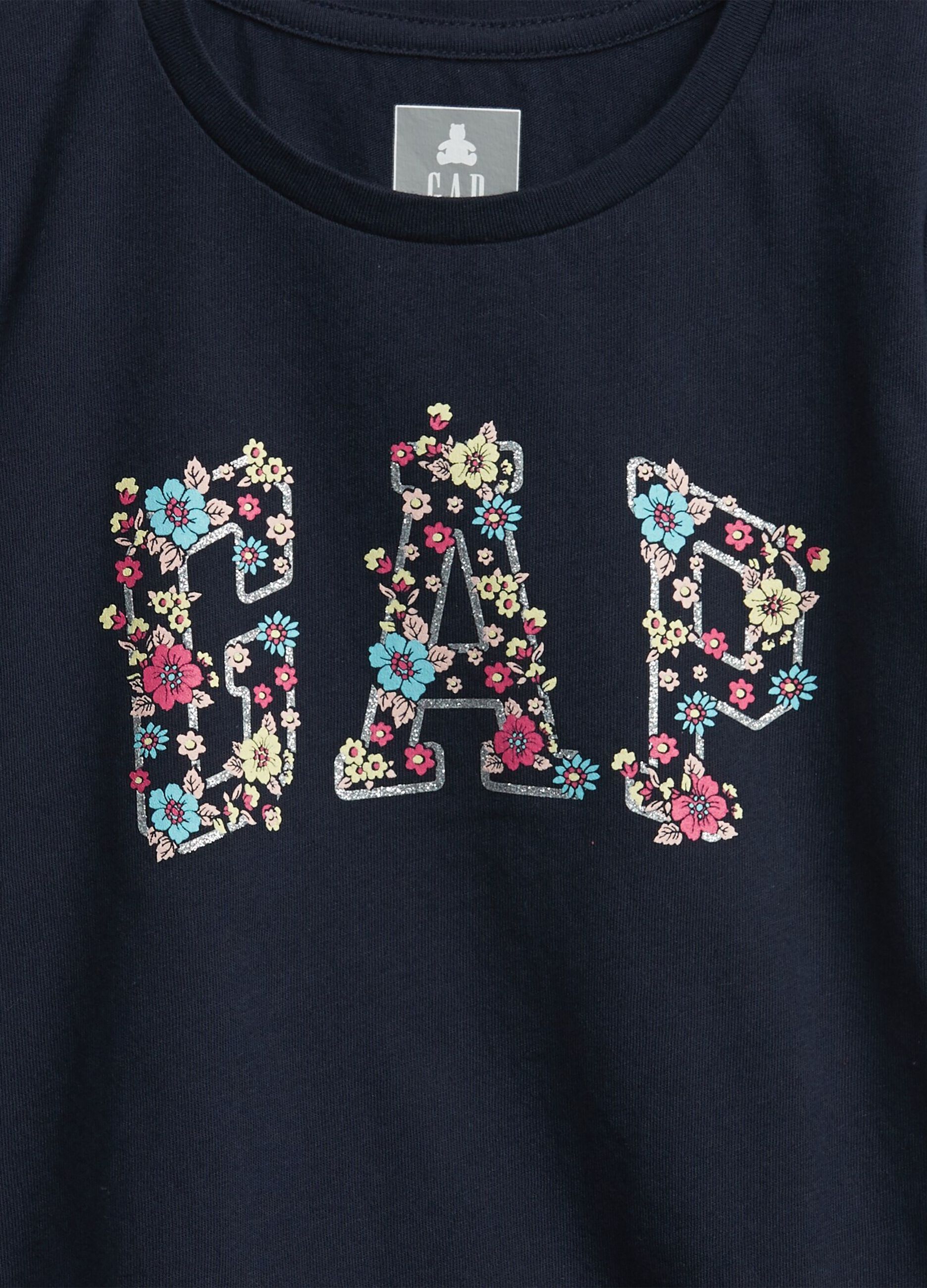 Camiseta con logo de flores estampado