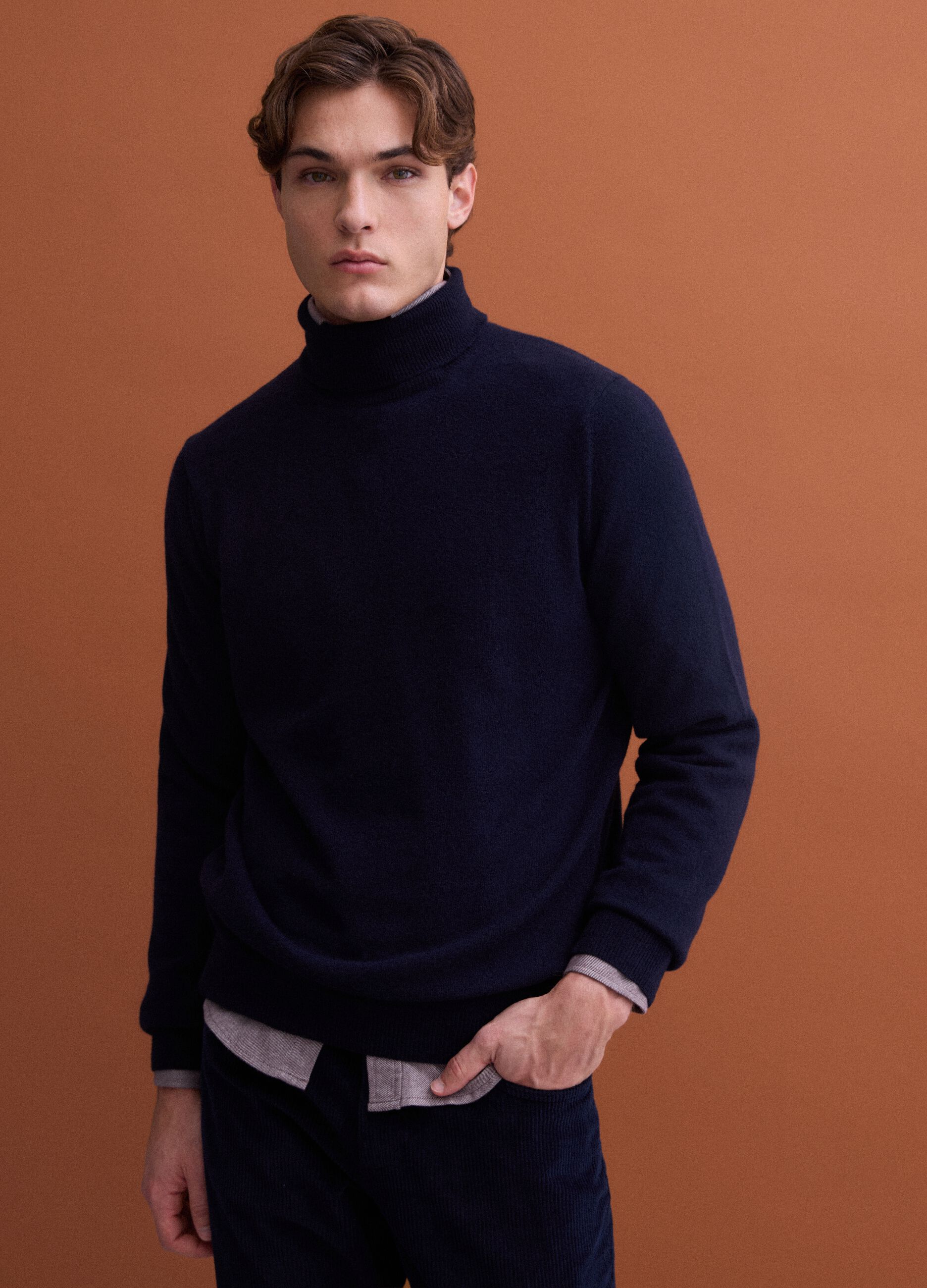 Navy blue pure lambswool roll-neck jumper