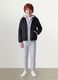 Black oversized rain jacket with hood and zip for boys_1
