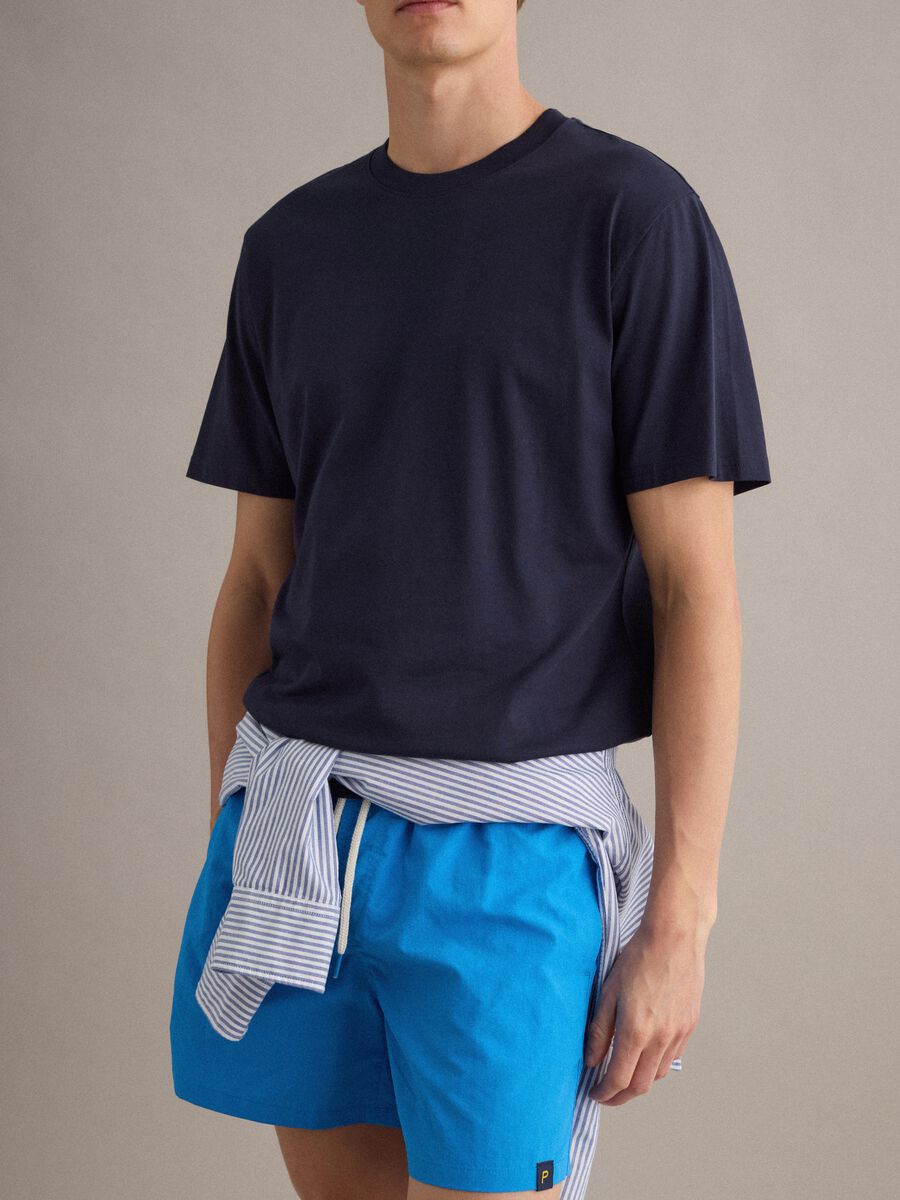 Blue swim shorts with elasticated waistband and contrast drawstring_3