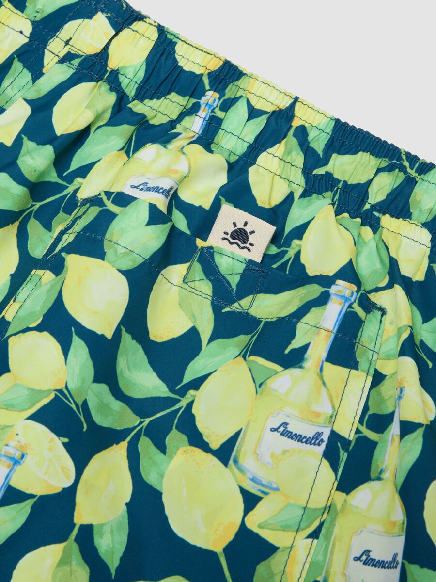 Blue boxer swim shorts with Limoncello print_5