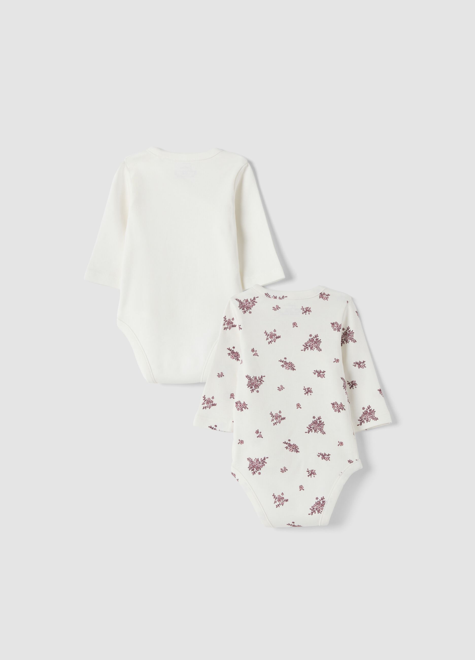 2-pack white organic cotton bodysuits with print