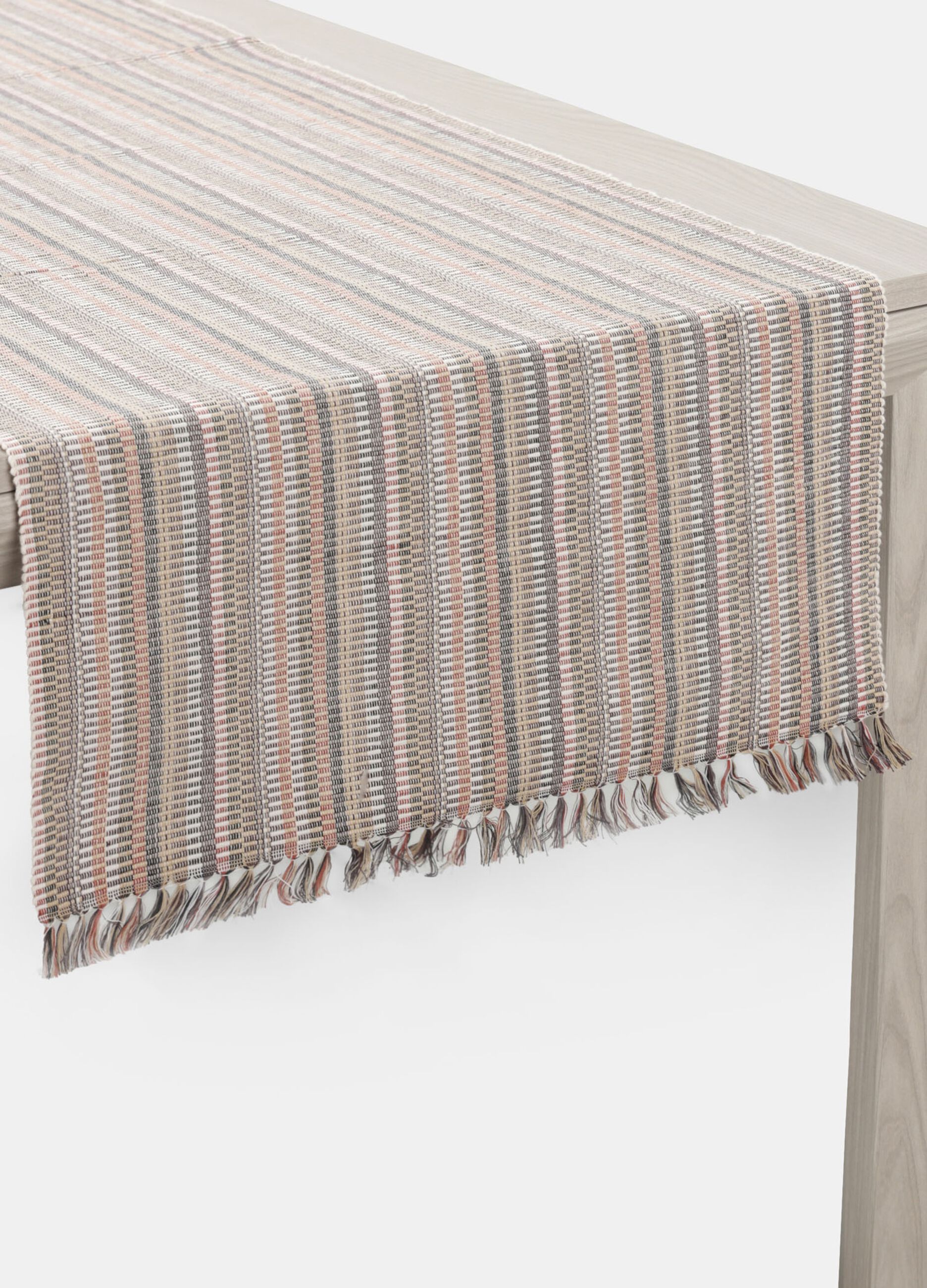 Cotton table runner with fringed edges