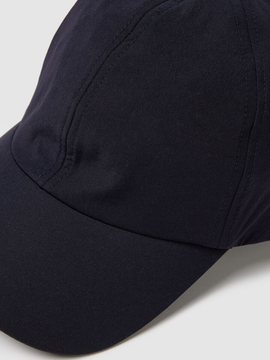 Blue cap with adjustable visor_3