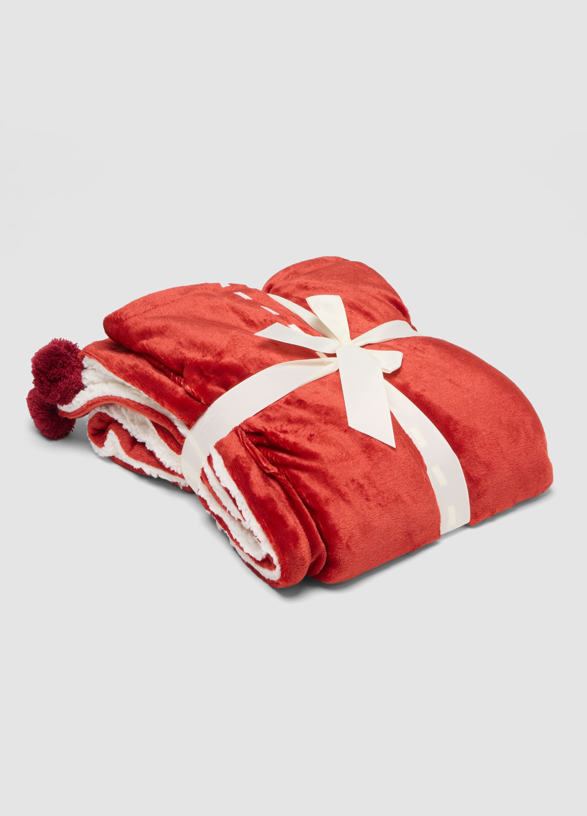 Red and white velvety-effect throw with contrasting lining