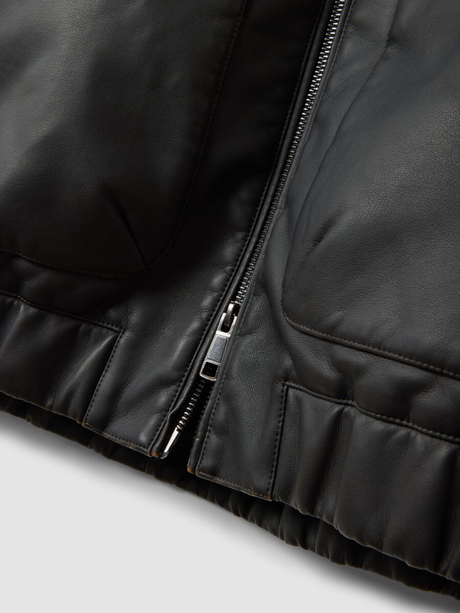 Black cropped jacket with zip and flap pockets, oversized fit_1