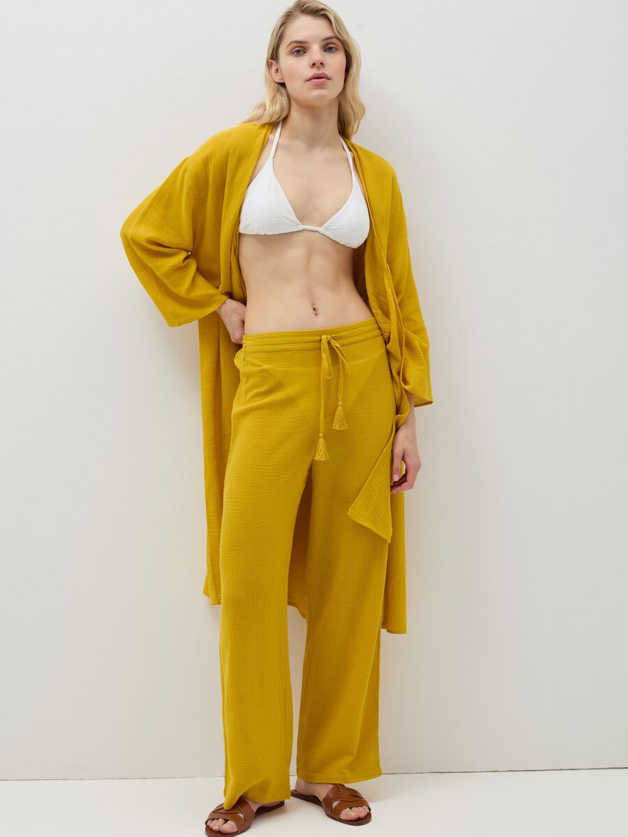 Beach cover-up trousers with tassels_0