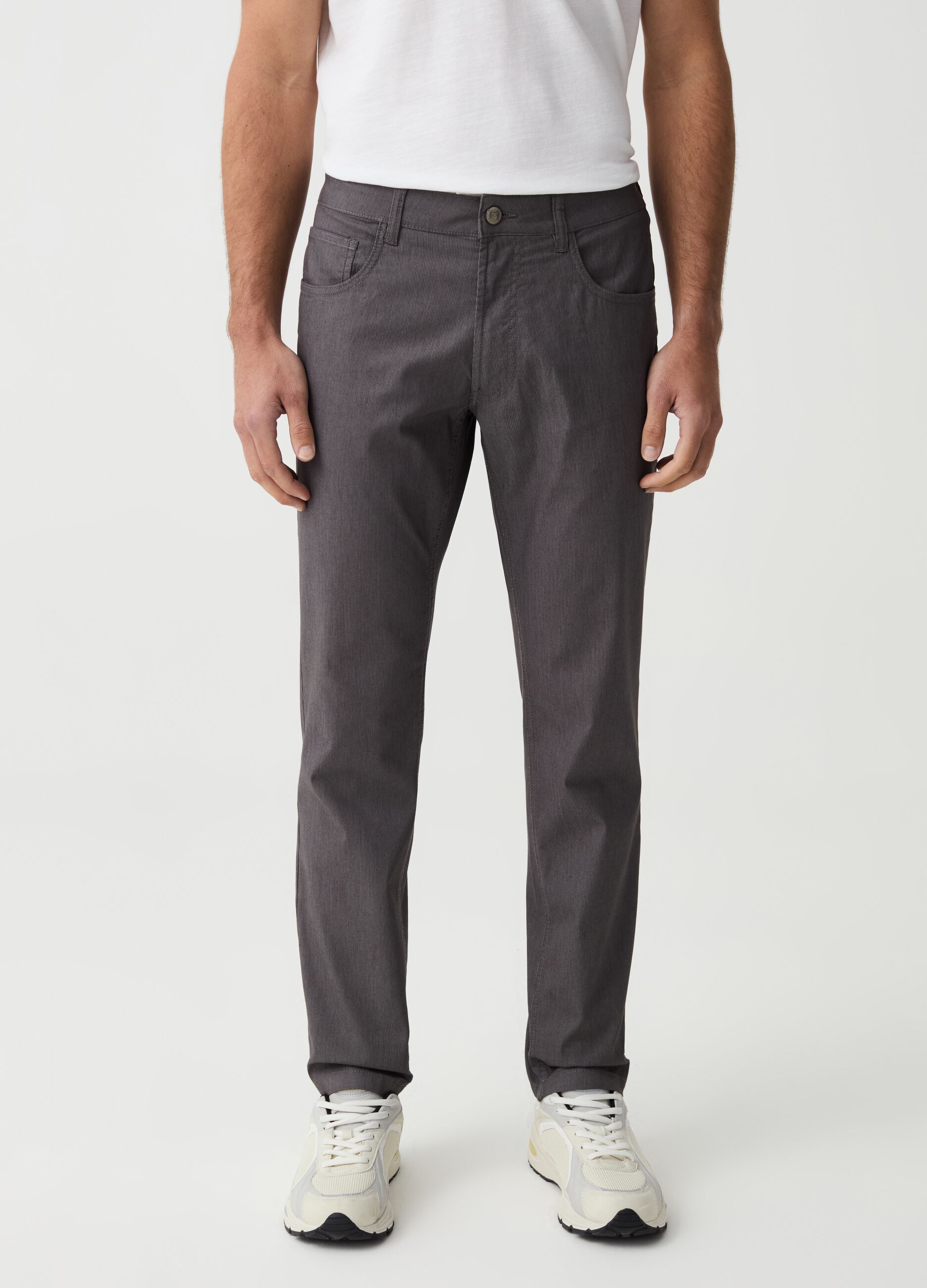 Slim-fit trousers with thin stripes