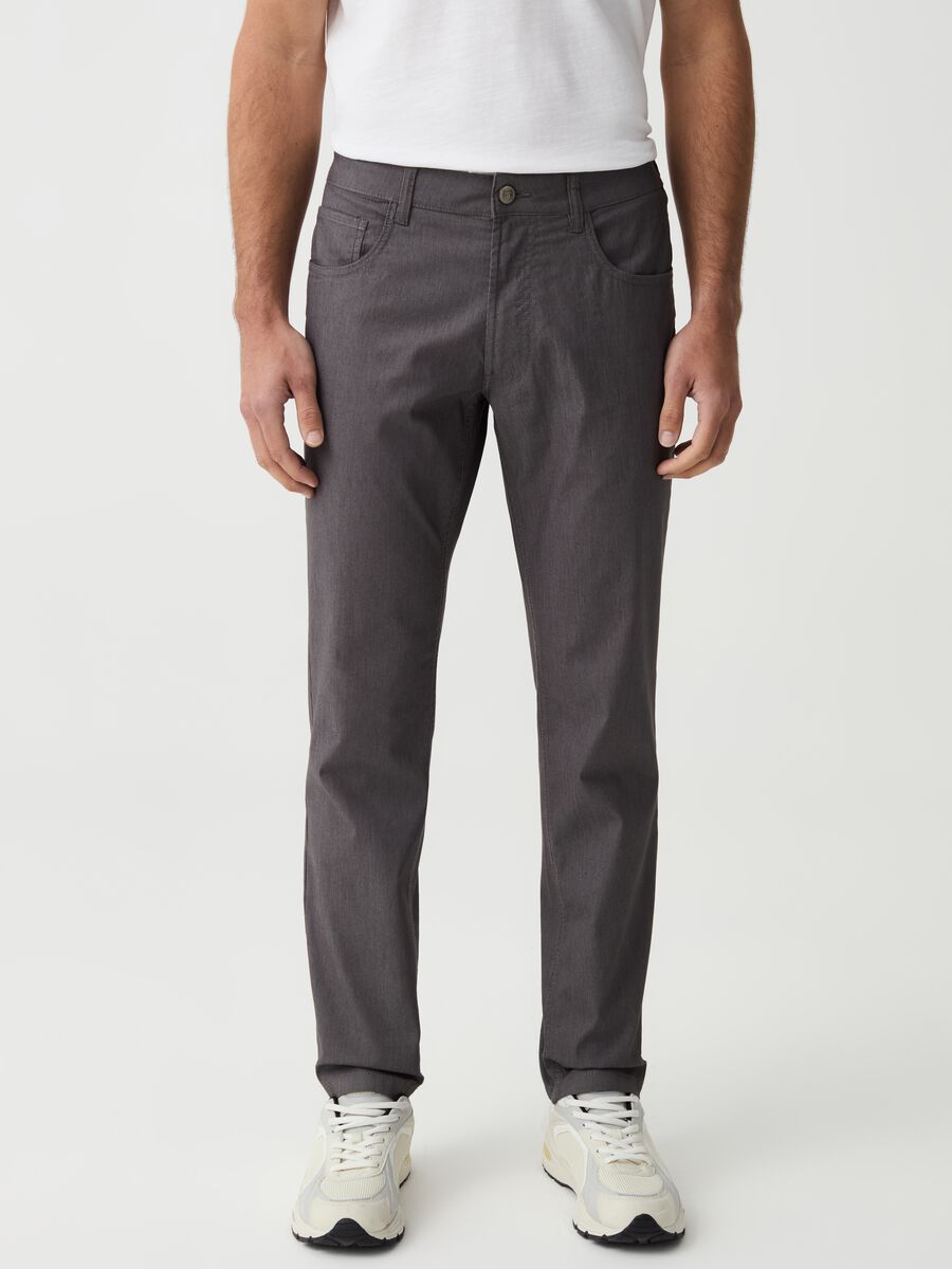 Slim-fit trousers with thin stripes_1