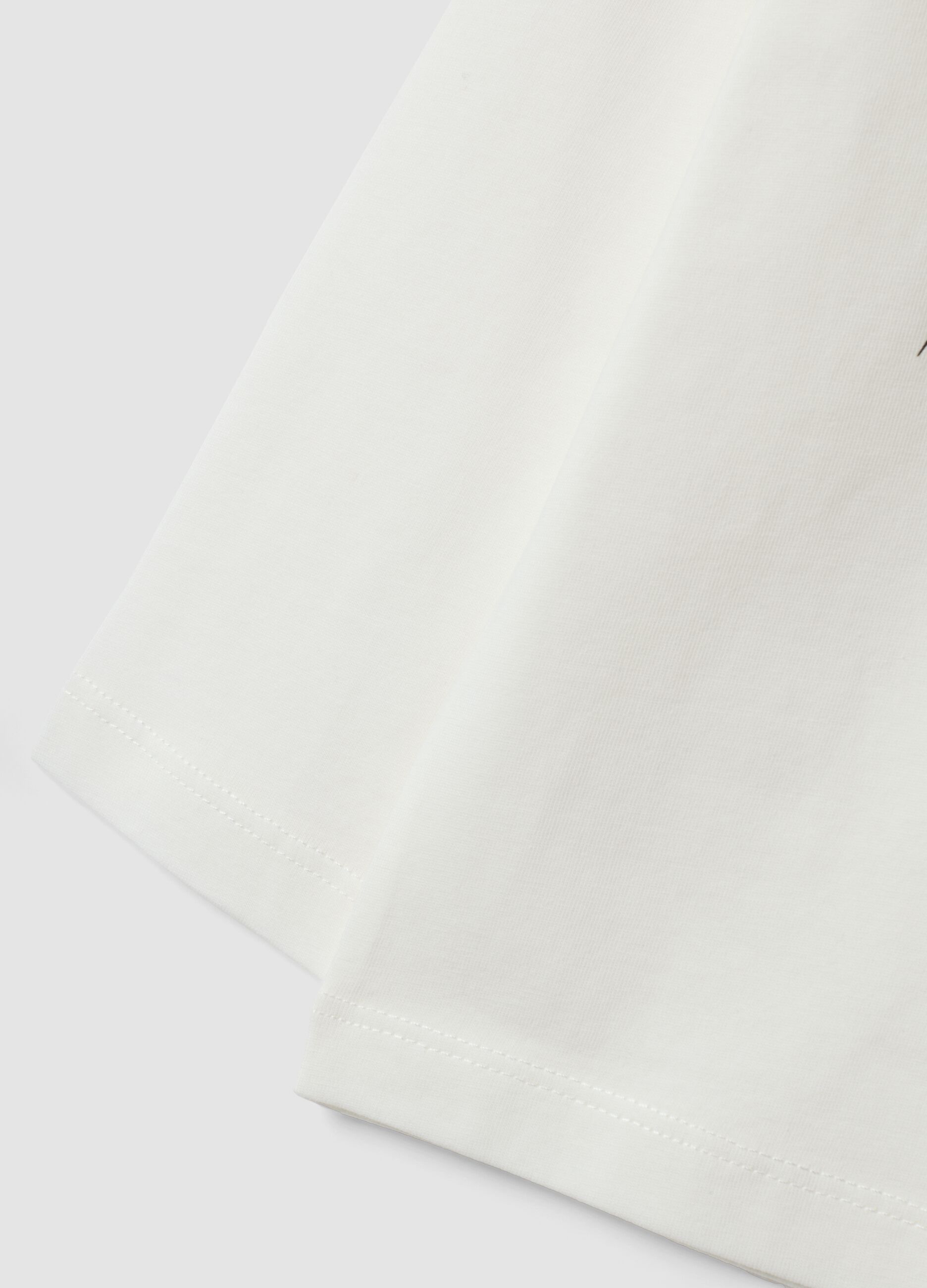 T-shirt bianca in puro cotone con stampa tigre over fit per bambino