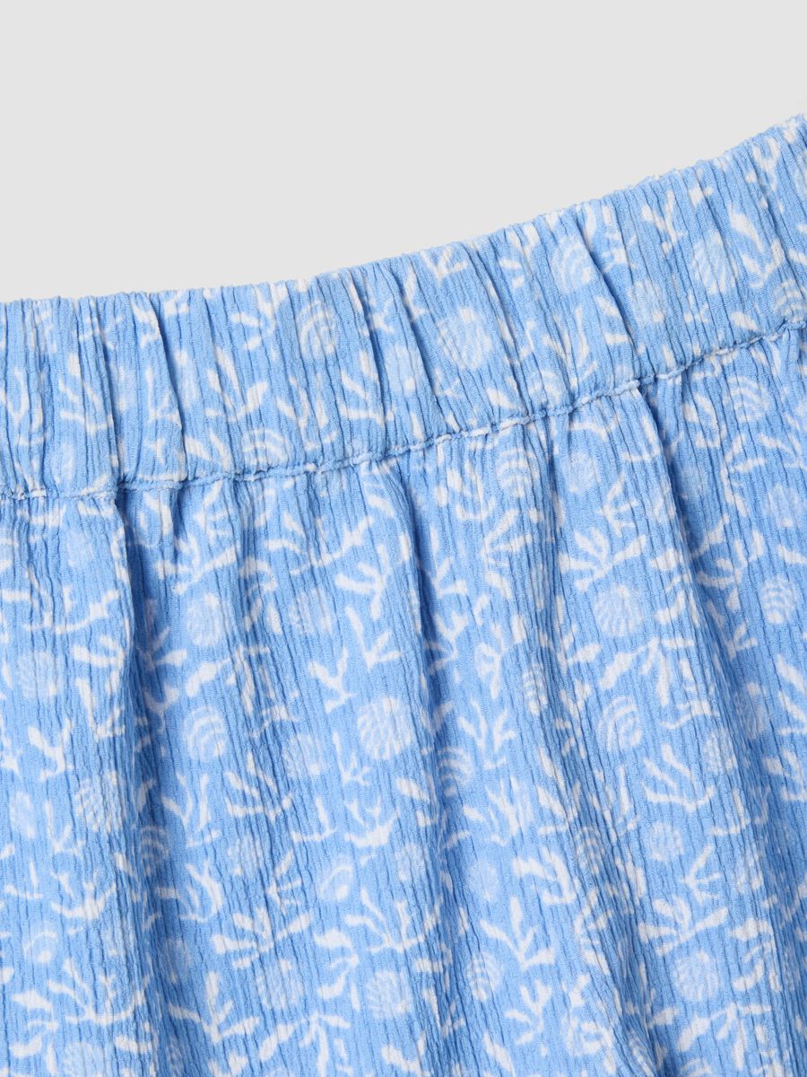 Conjunto azul em tecido el&aacute;stico com top sem mangas e cal&ccedil;&otilde;es_2