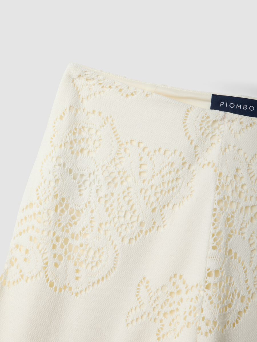 White wide leg cotton blend trousers with perforated texture_6