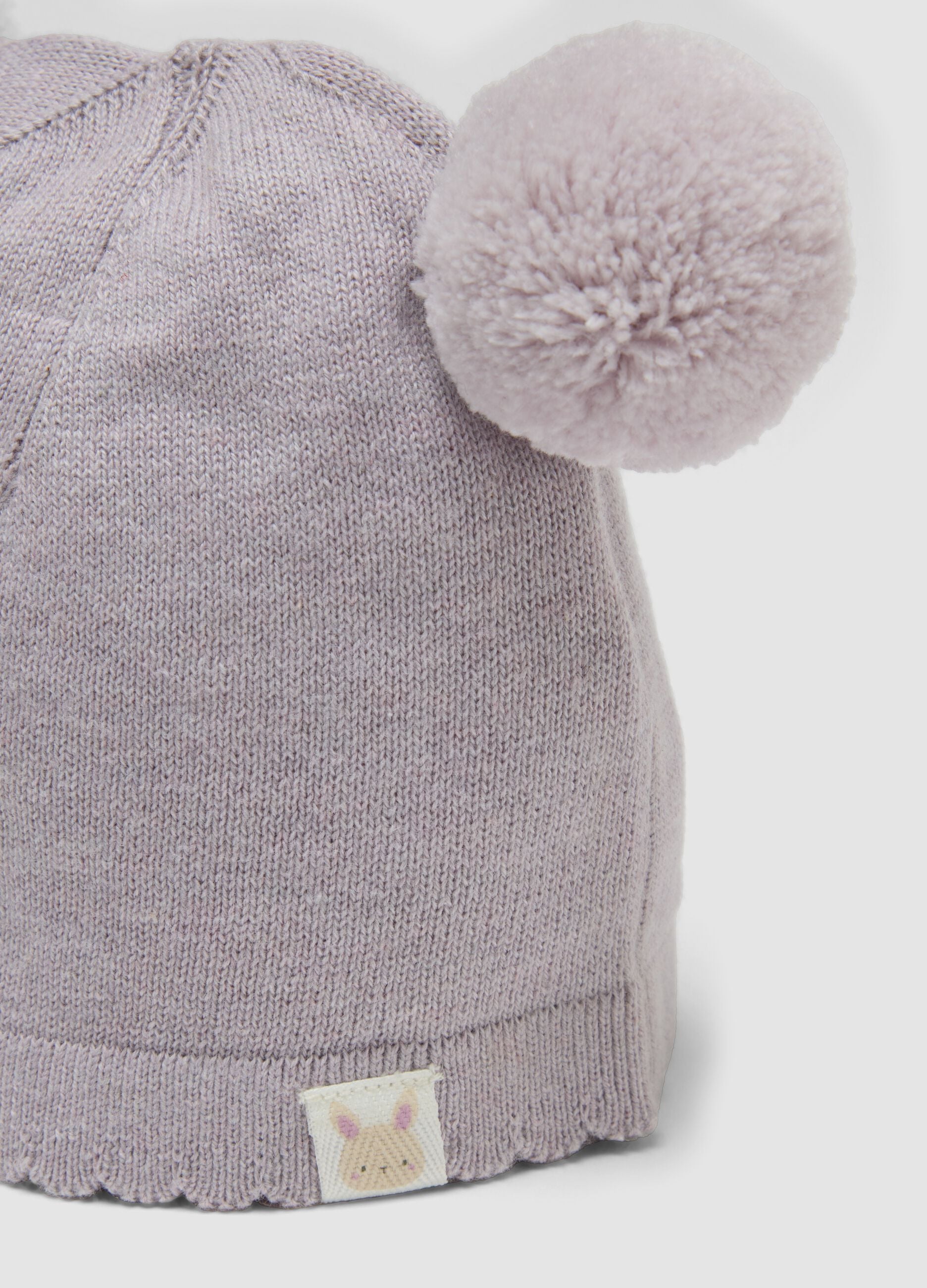 Rosa Strickm&uuml;tze aus reiner Bio-Baumwolle mit Pompons f&uuml;r Baby-M&auml;dchen