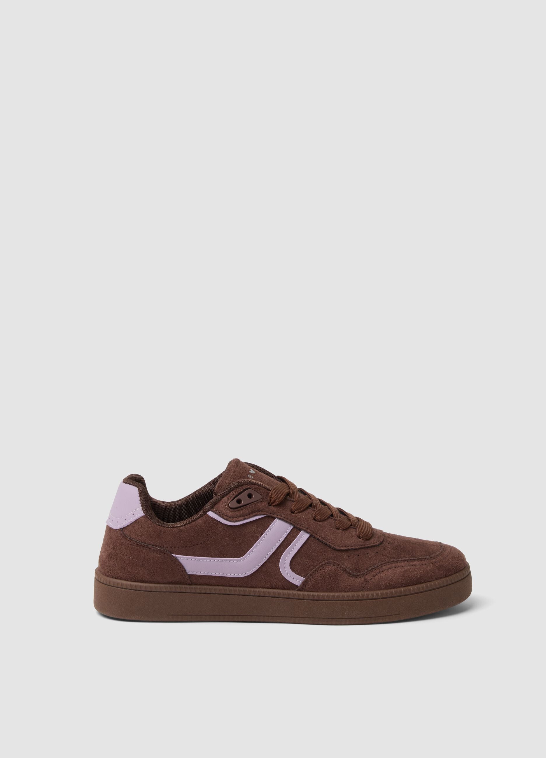 Brown trainers with pink inserts