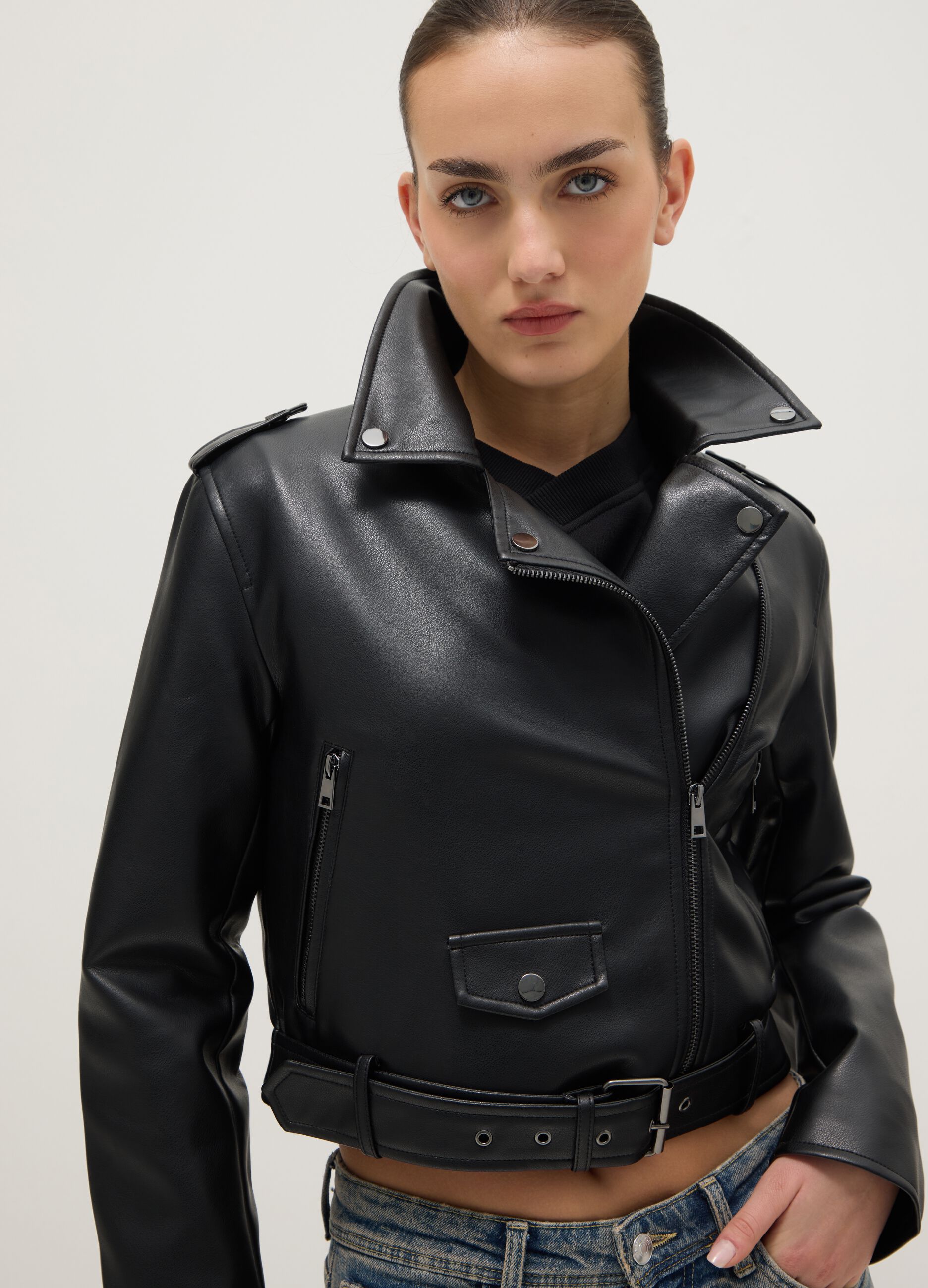 Black biker jacket regular fit with metallic details and diagonal zip